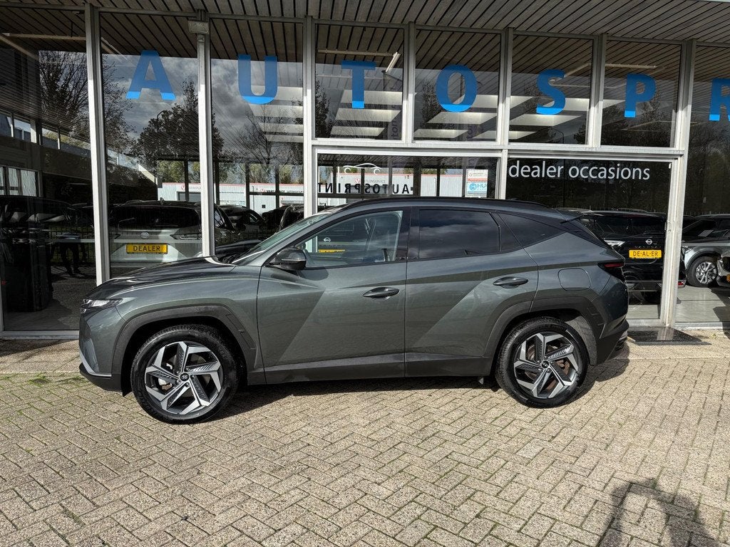 Hyundai Tucson 1.6 T-GDI PHEV Comfort 4WD 265PK / ACHTERUITR, Auto's, Hyundai, Automaat, Stof, Zwart, 4 cilinders