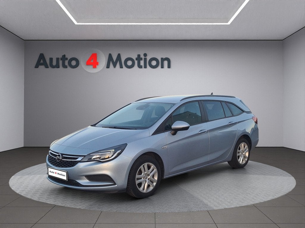 Opel Astra Sports Tourer 1.4 Turbo Cosmo Met ECC / NAVIG / C, Voorwielaandrijving, 125 pk, Gebruikt, Euro 6