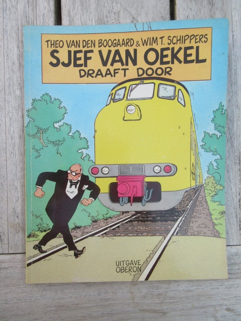 Sjef van Oekel draaft door. Wim T Schippers nr 1, Boeken, Stripboeken, Theo van den Boogaard, Wim T. Schippers, Eén stripboek