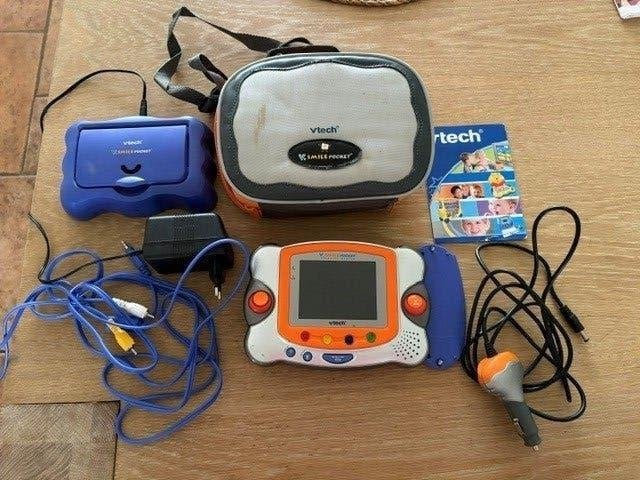 Vtech V.Smile Pocket spelcomputer met 5 spellen, Ophalen of Verzenden, Overige merken, Gebruikt