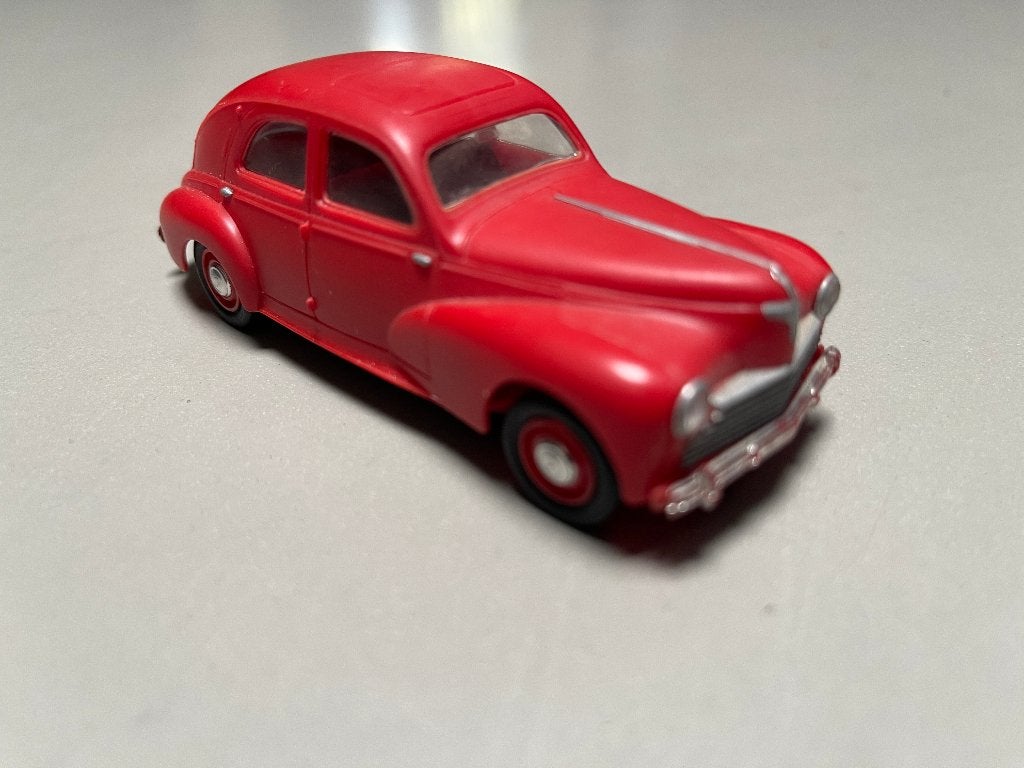 Peugeot 203 (merkloos) vijftig. schaal 1:43, Ophalen of Verzenden, Zo goed als nieuw, Auto, Overige merken