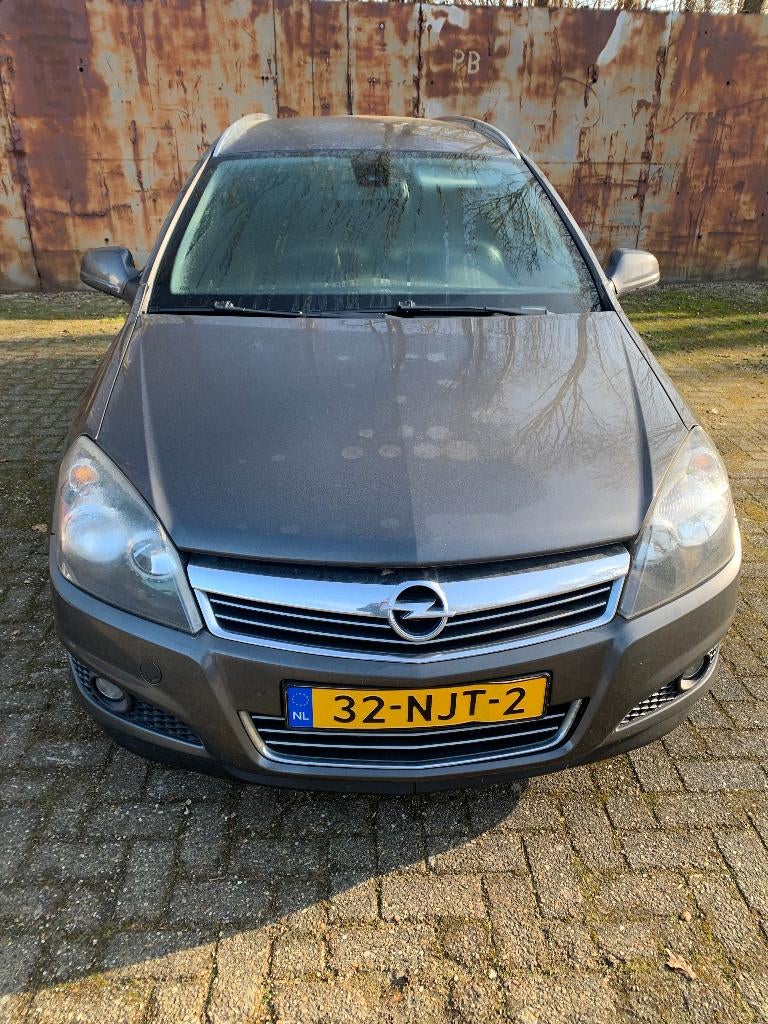 ASTRA 1.6 STATION 111JAHRE EDITION ORGINEEL NL + OPTIES 2010, Auto's, Voorwielaandrijving, Stof, Parkeersensor, Origineel Nederlands
