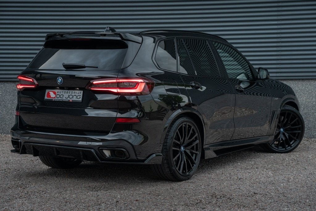 BMW X5 xDrive45e 394PK M-Sport | Pano | Trekhaak | 22" | Aer, Auto's, 12 maanden, Gebruikt, 394 pk, Zwart