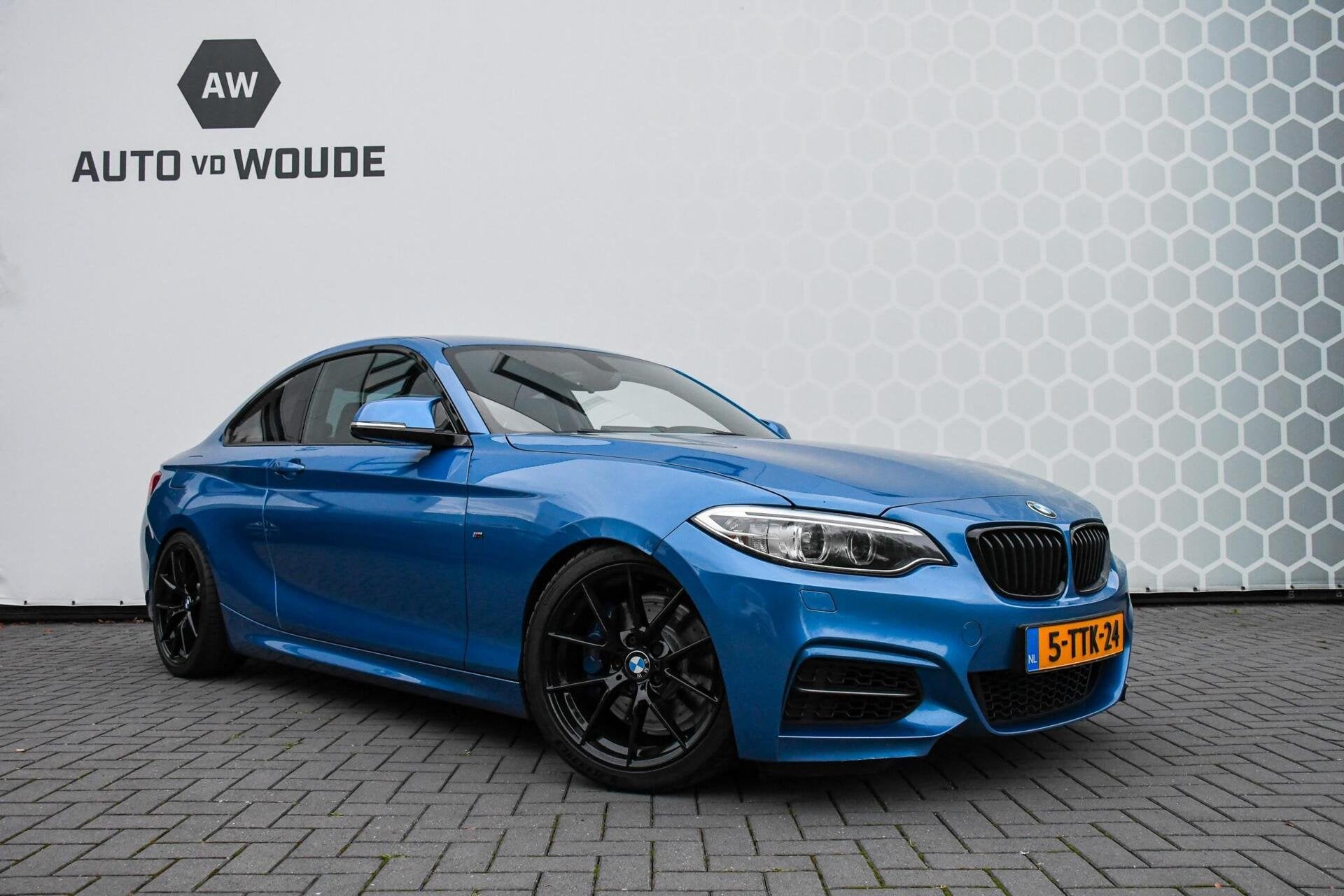 BMW 2-serie Coupé M235i High Executive KW Schroefset 400PK, Auto's, Achterwielaandrijving, Gebruikt, 1445 kg, 6 cilinders