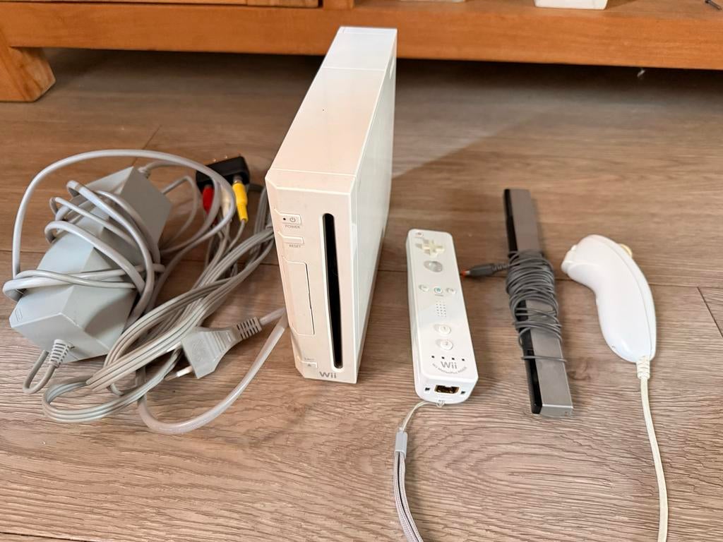 Complete Nintendo Wii met spellen, extra's en Wii Motion, Spelcomputers en Games, Ophalen of Verzenden, Zo goed als nieuw, Met 1 controller