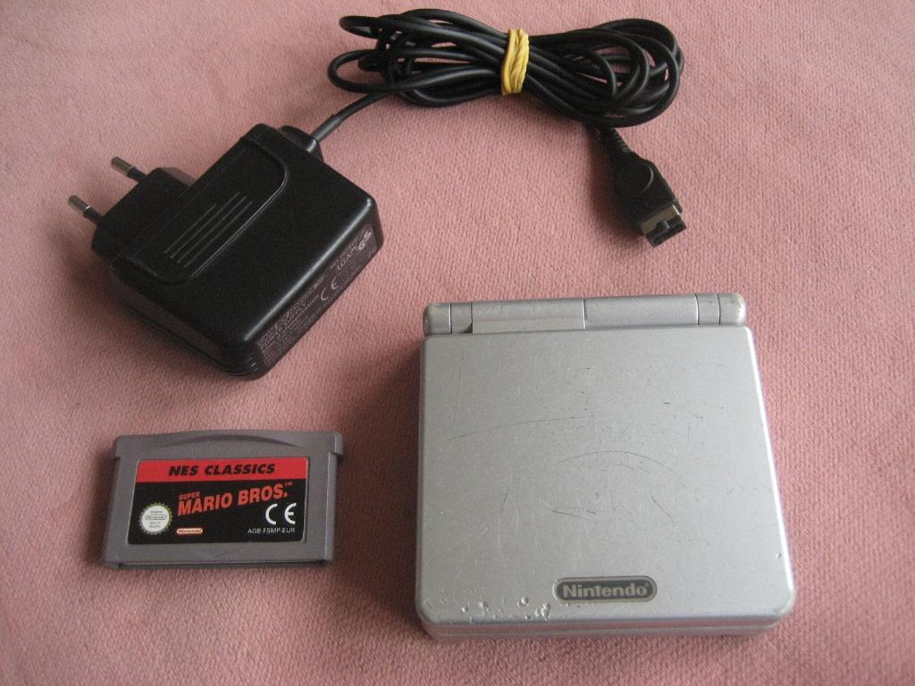 Game Boy Advance SP met oplader en Mario Bros, Spelcomputers en Games, Spelcomputers | Nintendo Game Boy, Ophalen of Verzenden