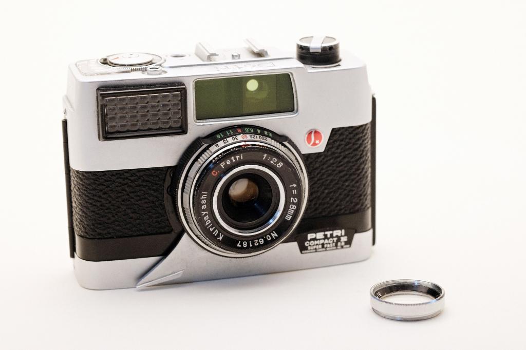 Petri Compact E, Half frame met Rapidwinder, Ophalen of Verzenden, Zo goed als nieuw, Compact, Overige Merken