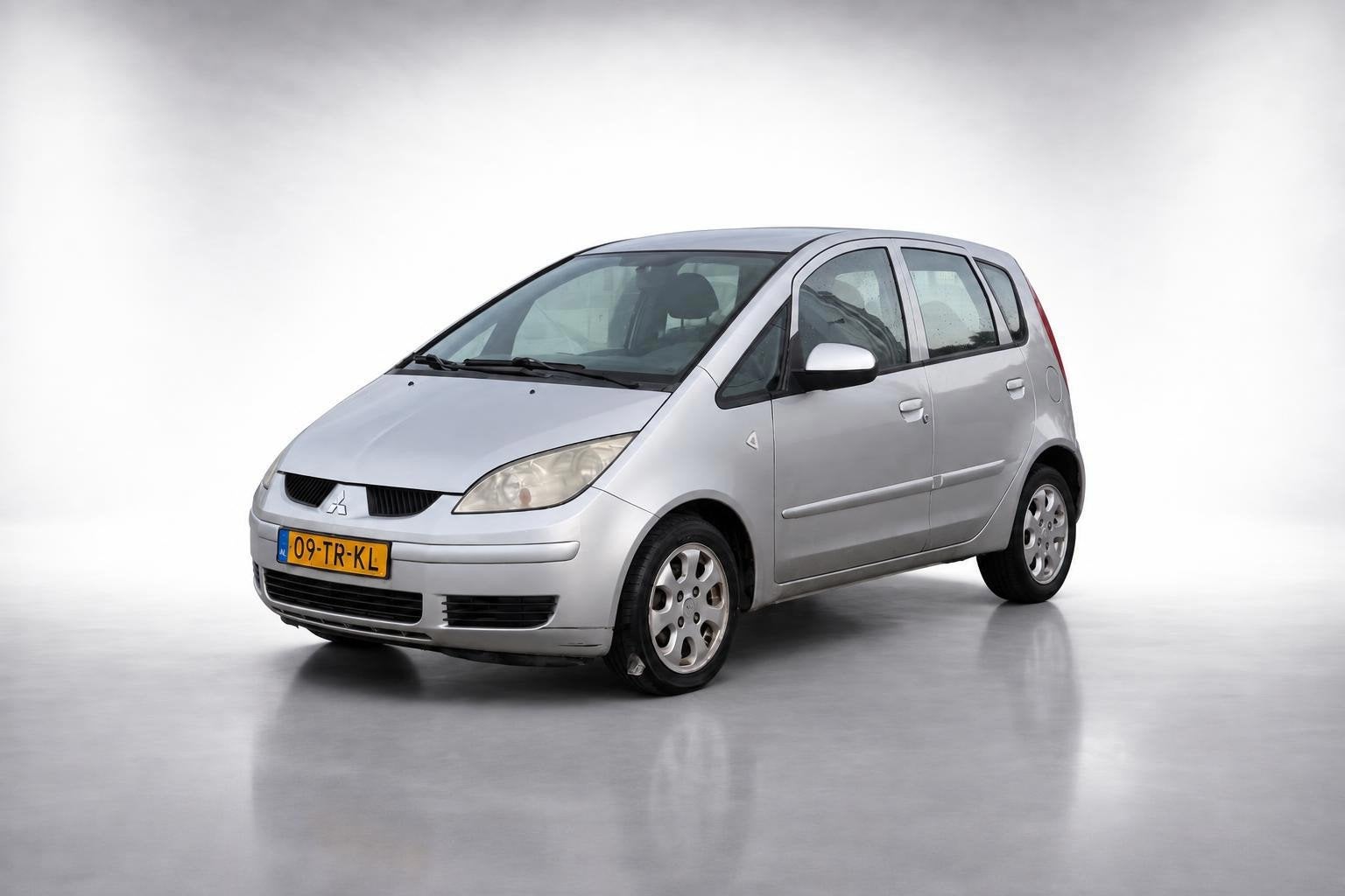 Mitsubishi Colt 1.3 Invite|airco|jaar APK, Auto's, Gebruikt, 31 €/maand, Verwarmde buitenspiegels, Colt