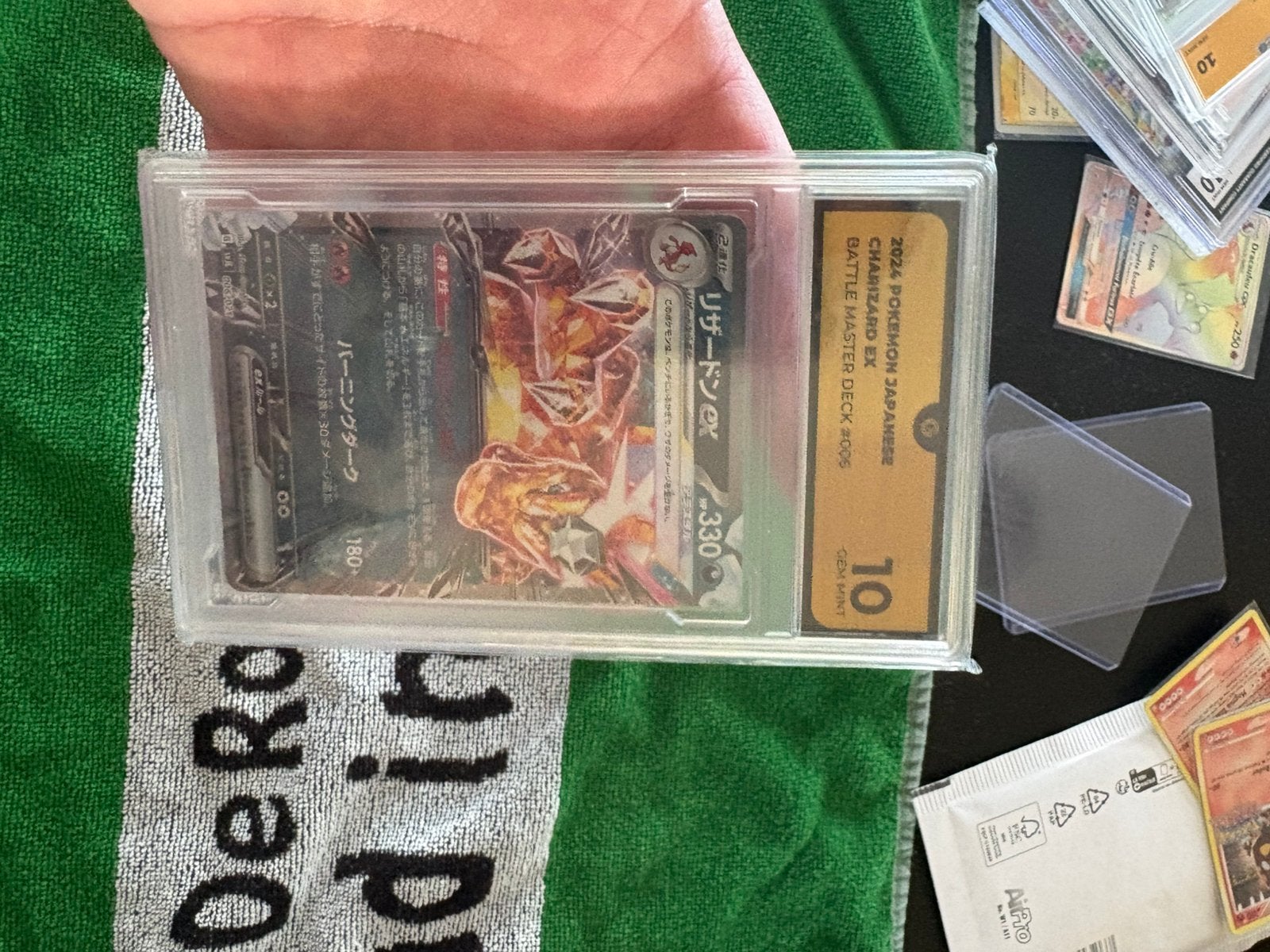 Charizard ex grade 10, Ophalen of Verzenden, Zo goed als nieuw, Meerdere kaarten, Foil