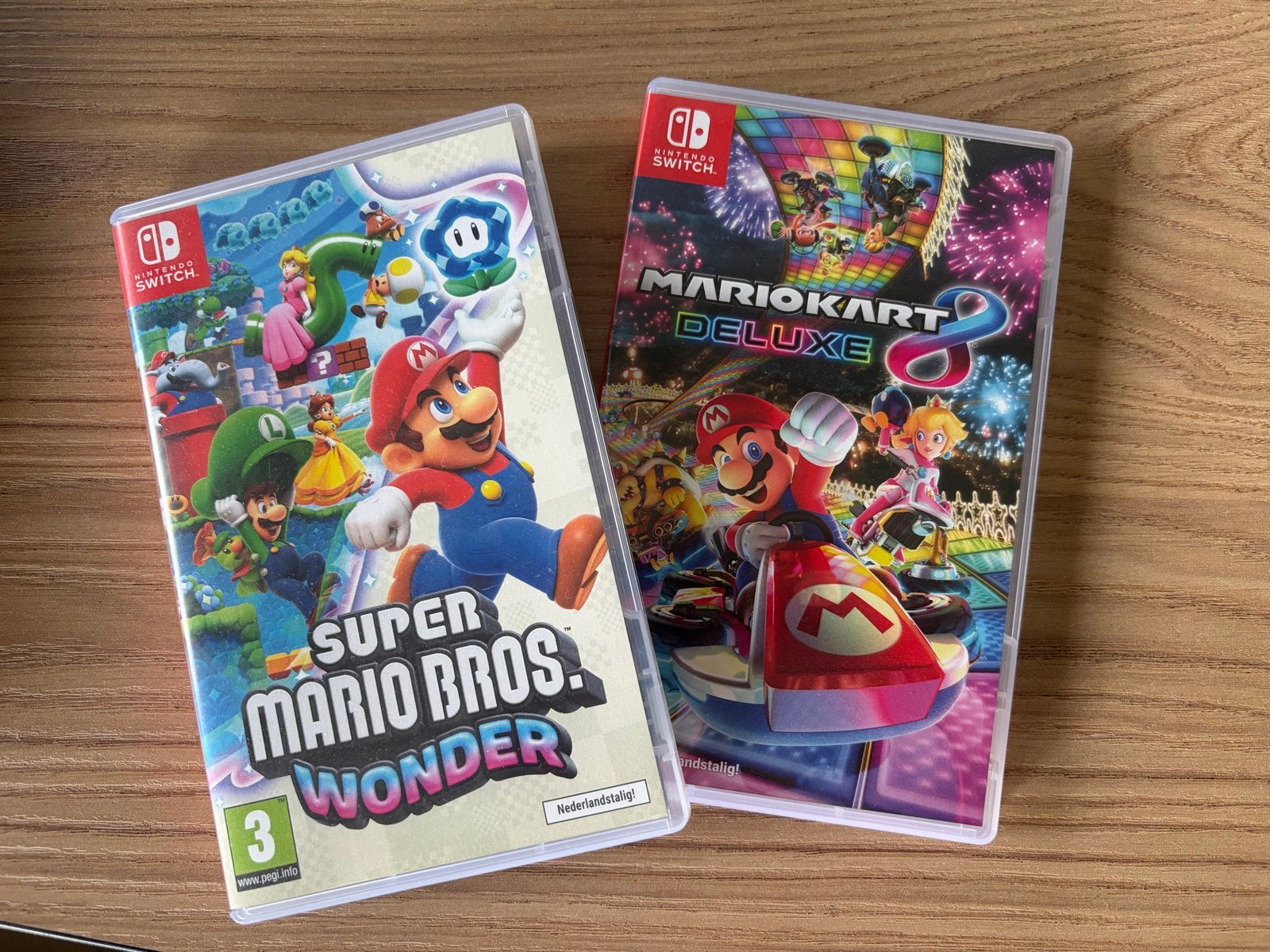 Foto 4 van Nintendo Switch OLED met 2 games en accessoires