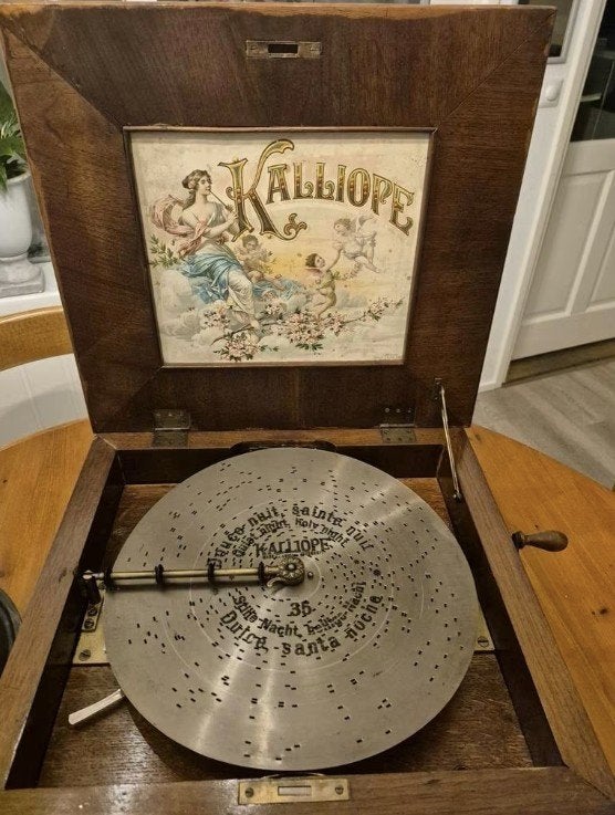 Antieke Kalliope muziekdoos 1890/1900 met 13 schijven, Ophalen
