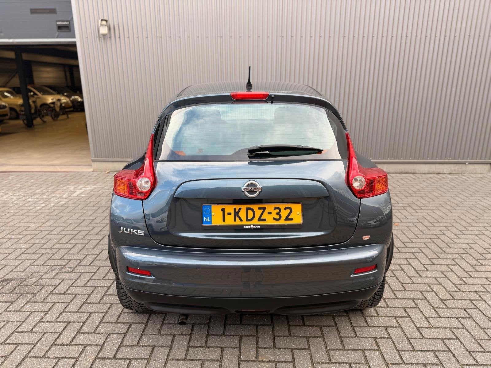 Nissan Juke 1.6 Acenta Automaat|Climate control|Cruise contr, Euro 5, Zwart, 4 cilinders, Blauw