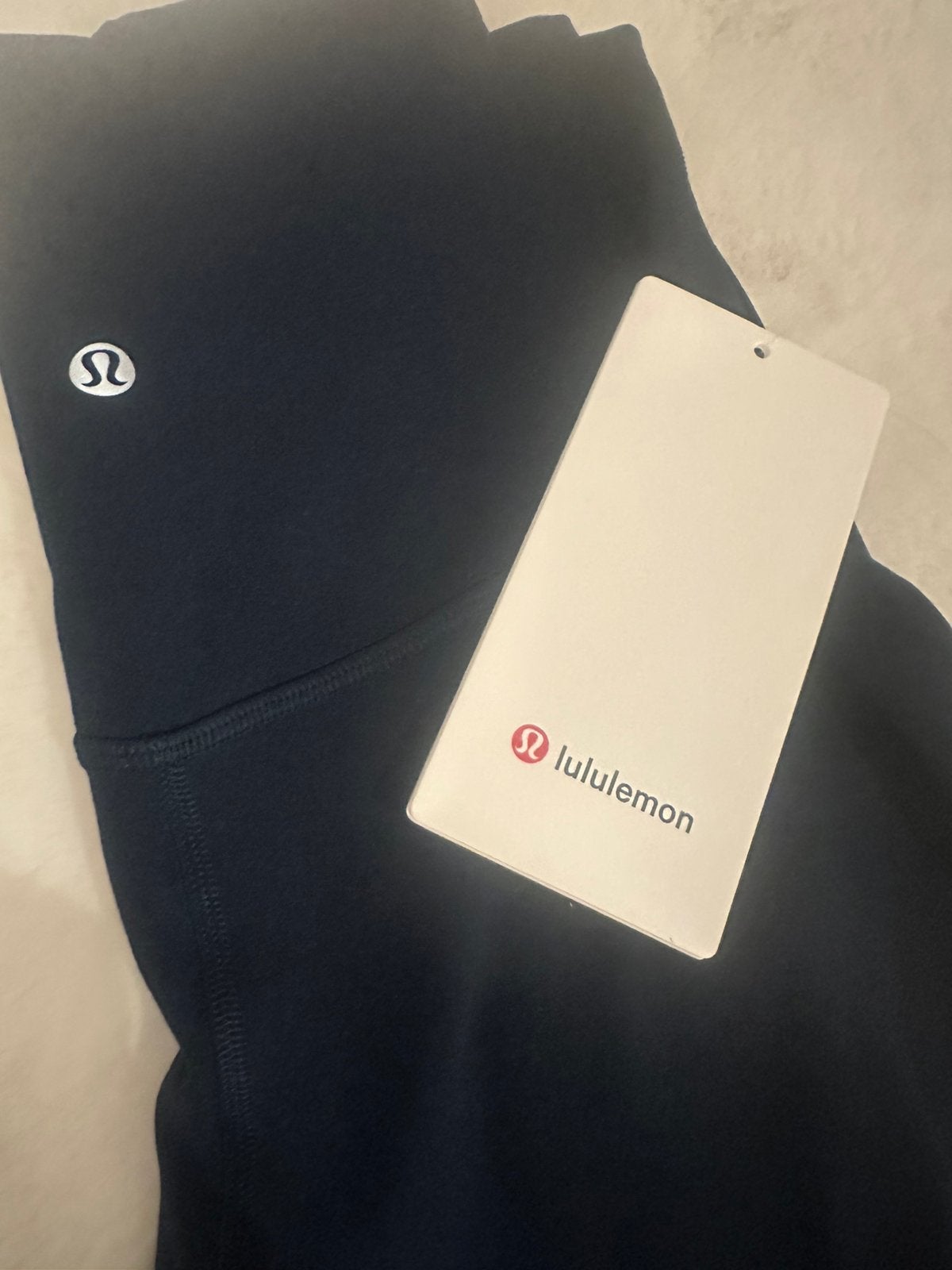 Nieuwe donkere blauwe Lululemon in maat 6 te koop., Kleding | Heren, Bodywarmers, Ophalen of Verzenden, Zo goed als nieuw, Blauw