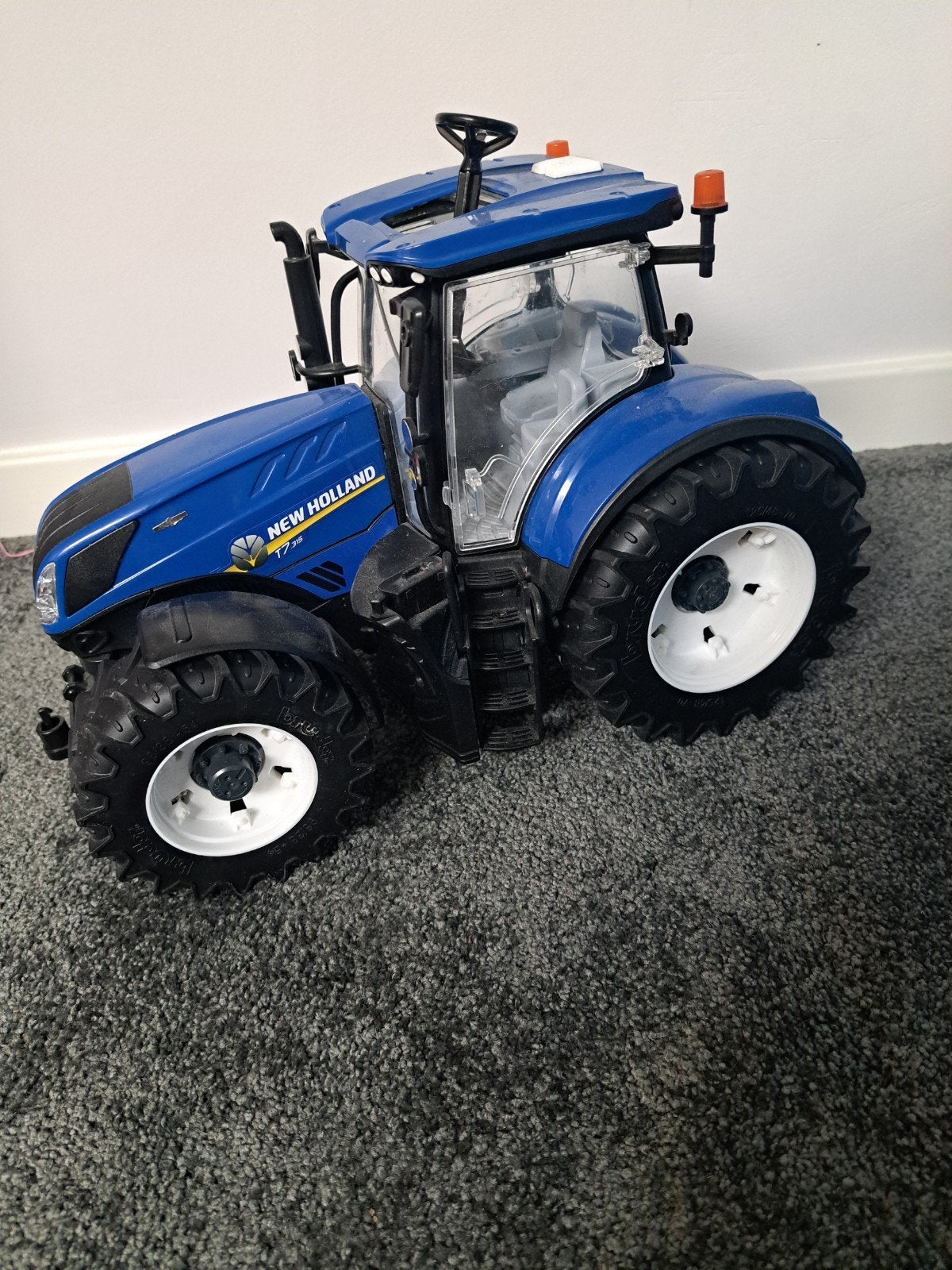 New Holland T7.315 van Bruder, Ophalen, Zo goed als nieuw