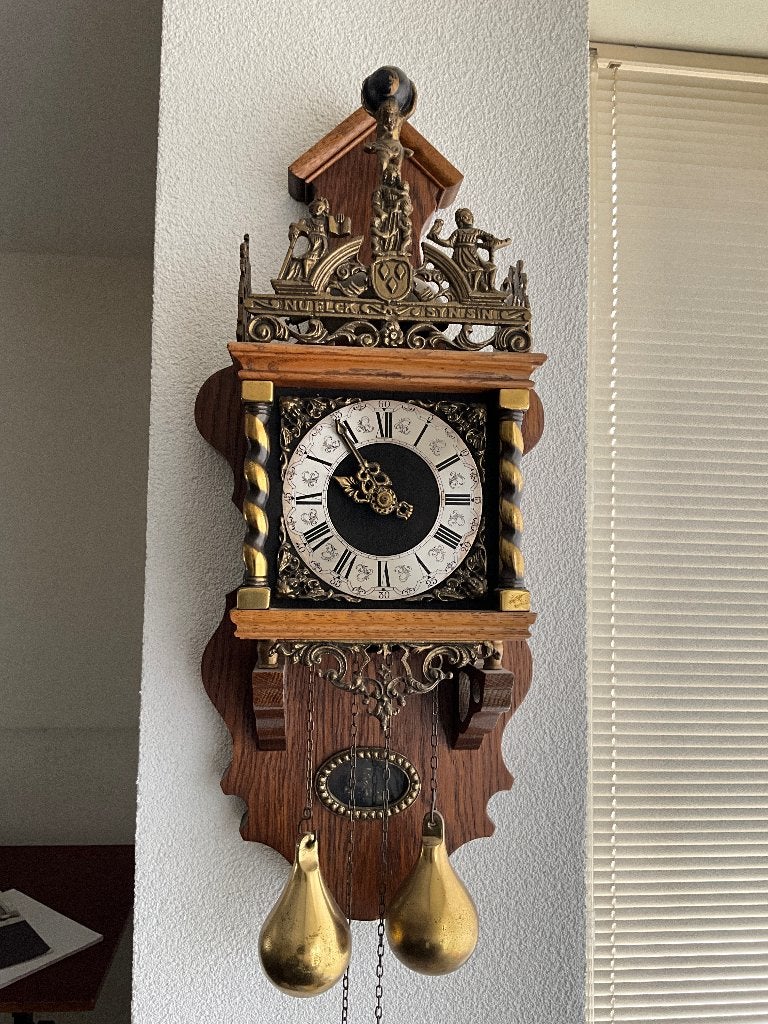 Zaanse Wuba wandklok, Ophalen