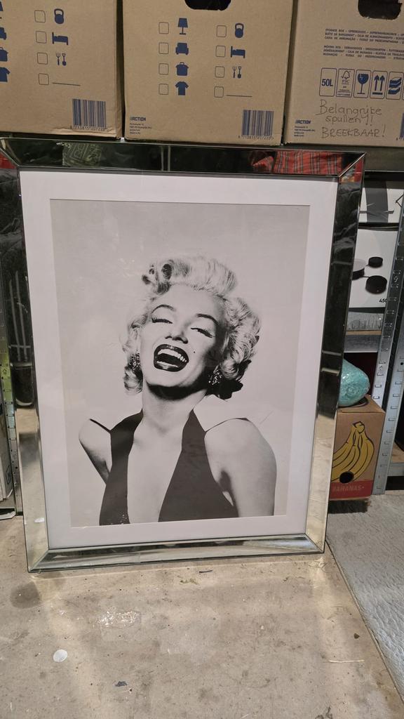 Marilyn Monroe schilderij, Ophalen