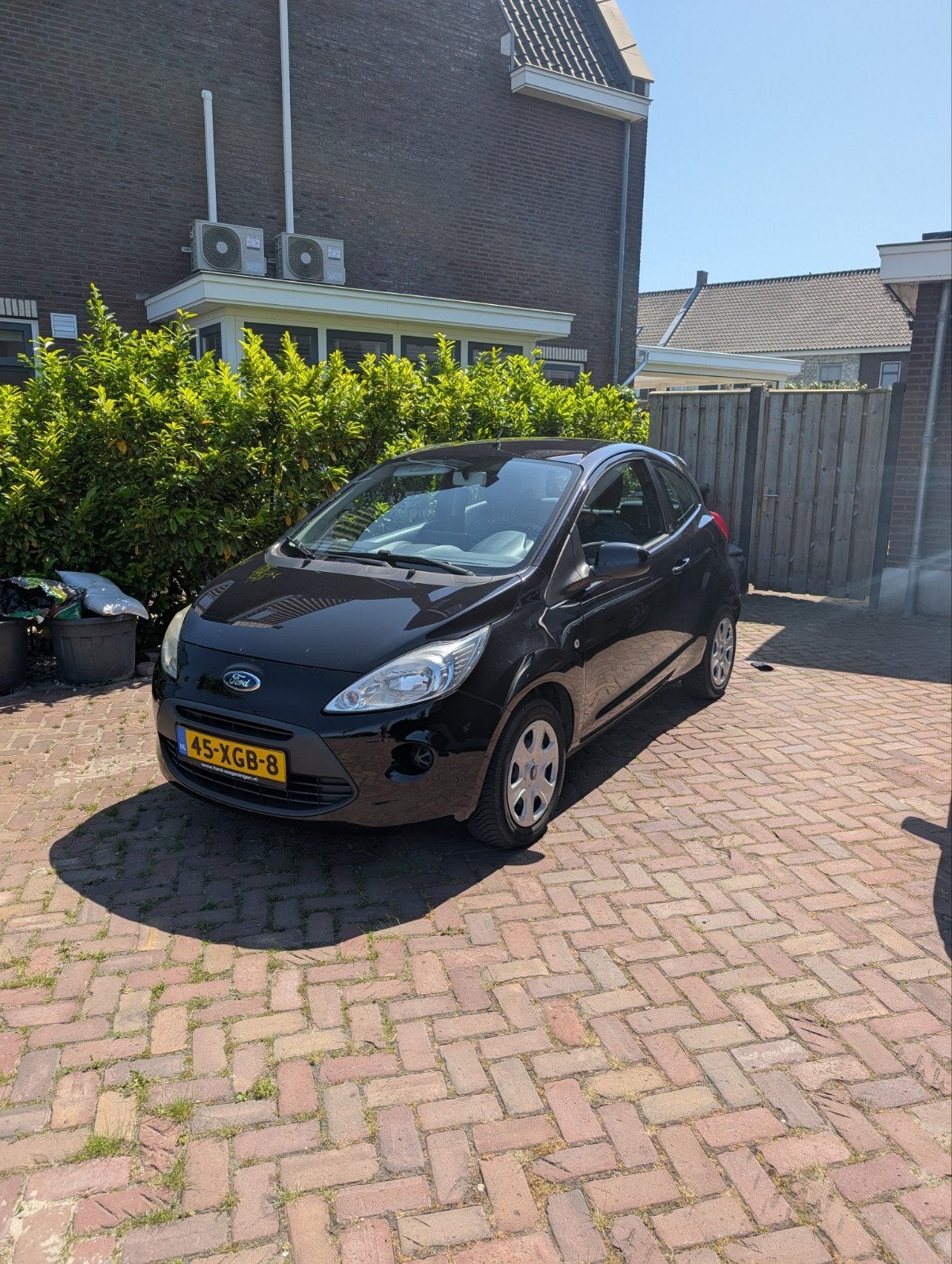 Ford Ka 1.2 69pk 2012 Zwart, Auto's, Voorwielaandrijving, Stof, 4 cilinders, 4 stoelen