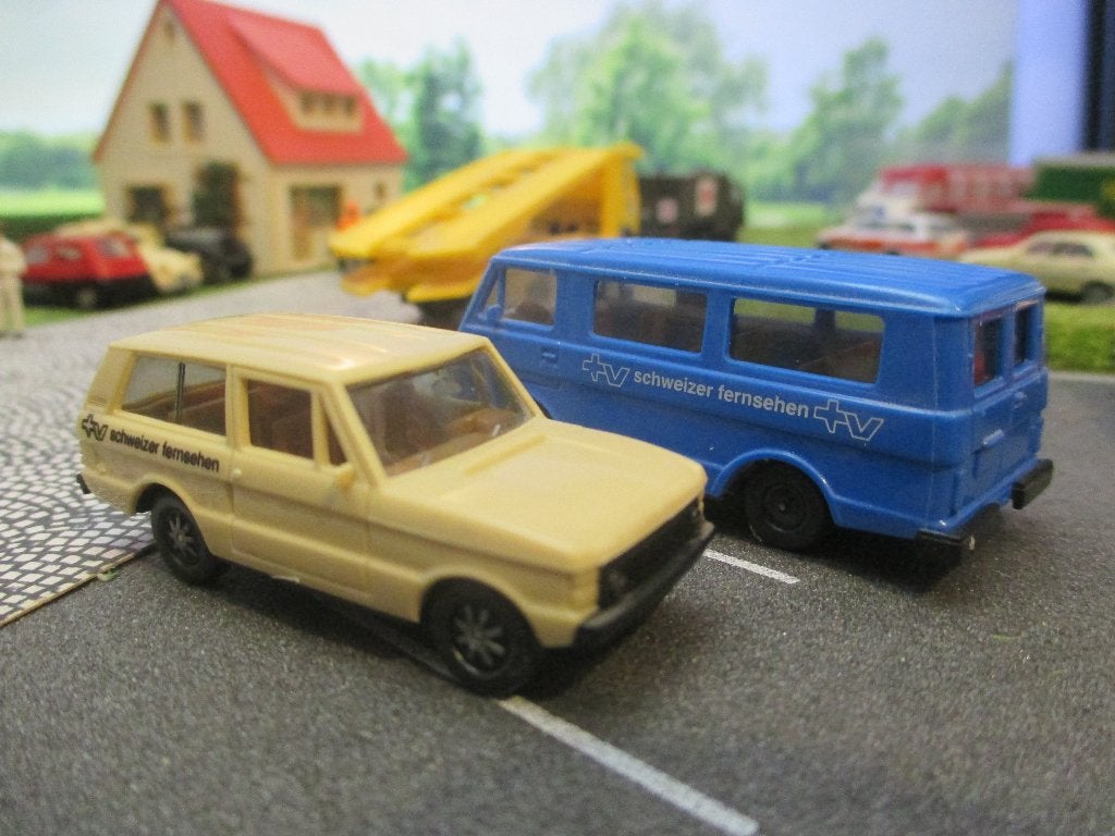 Range Rover Classic Herpa Schweizer Fernsehen TV Zwitserland, Ophalen of Verzenden, Zo goed als nieuw, Auto, Rietze