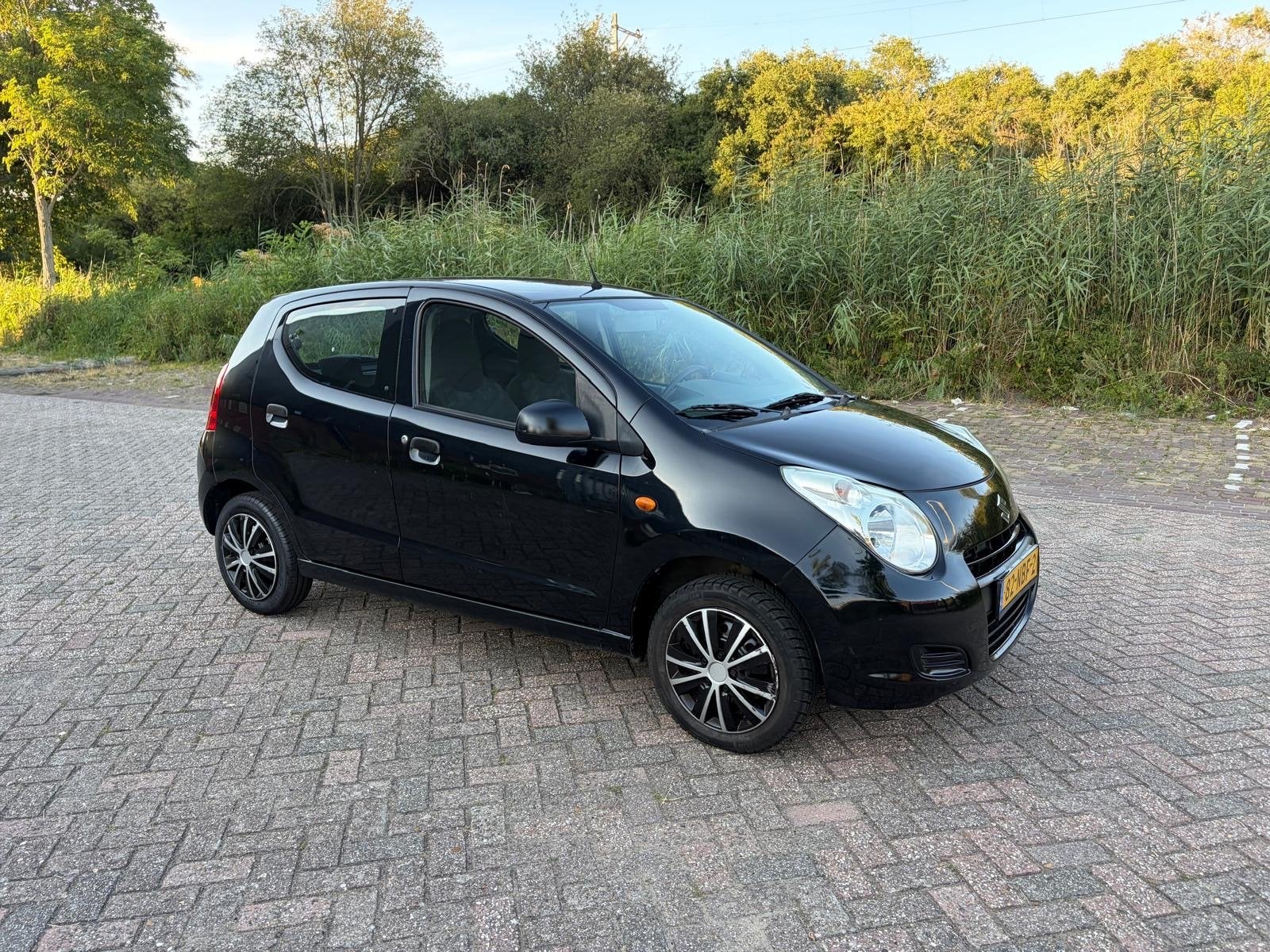 Suzuki Alto 1.0 Aut. 2010 Zwart. Km NAP, Euro 5, Stof, 4 stoelen, Origineel Nederlands