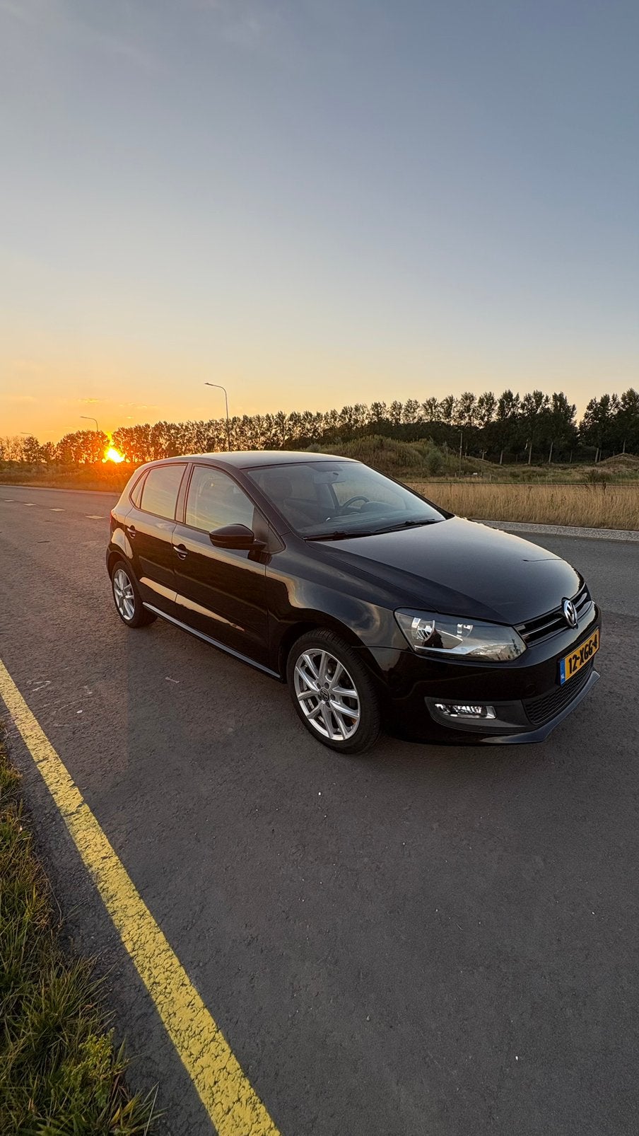 Volkswagen Polo 1.2 TSI 2012 Comfort Edition Nieuwe APK, Auto's, Voorwielaandrijving, 40 €/maand, 4 cilinders, Zwart