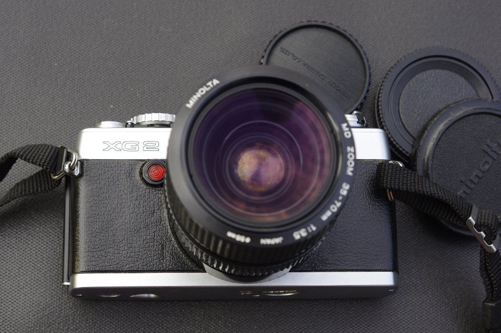 Minolta XG2 met 2 zoomlensen, 35-70mm en 70-210mm, Ophalen of Verzenden, Gebruikt, Spiegelreflex, Minolta