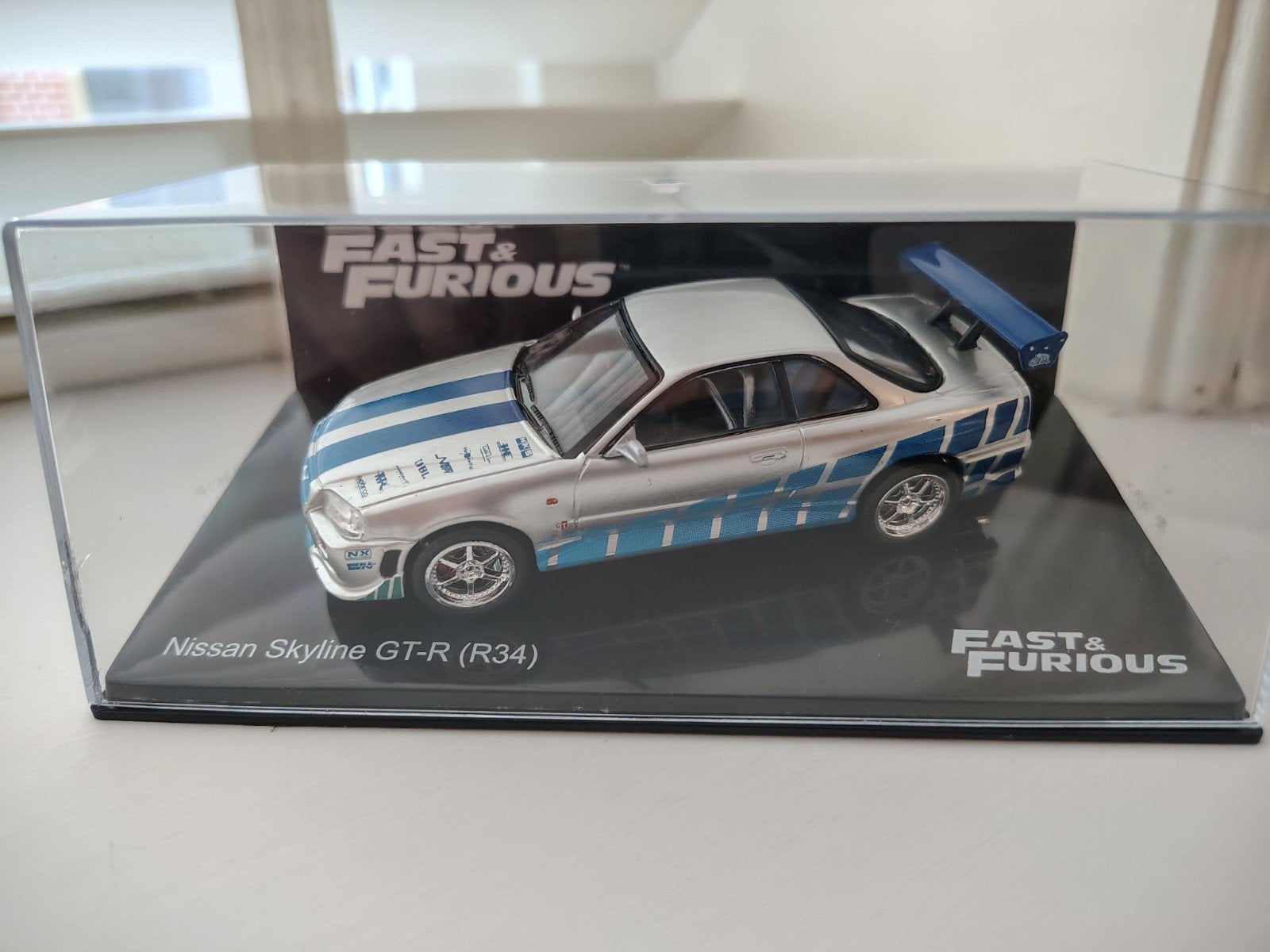 Nissan Skyline GT-R (R34) Fast & Furious 1:43 modelauto, Ophalen of Verzenden, Zo goed als nieuw, Auto, Overige merken