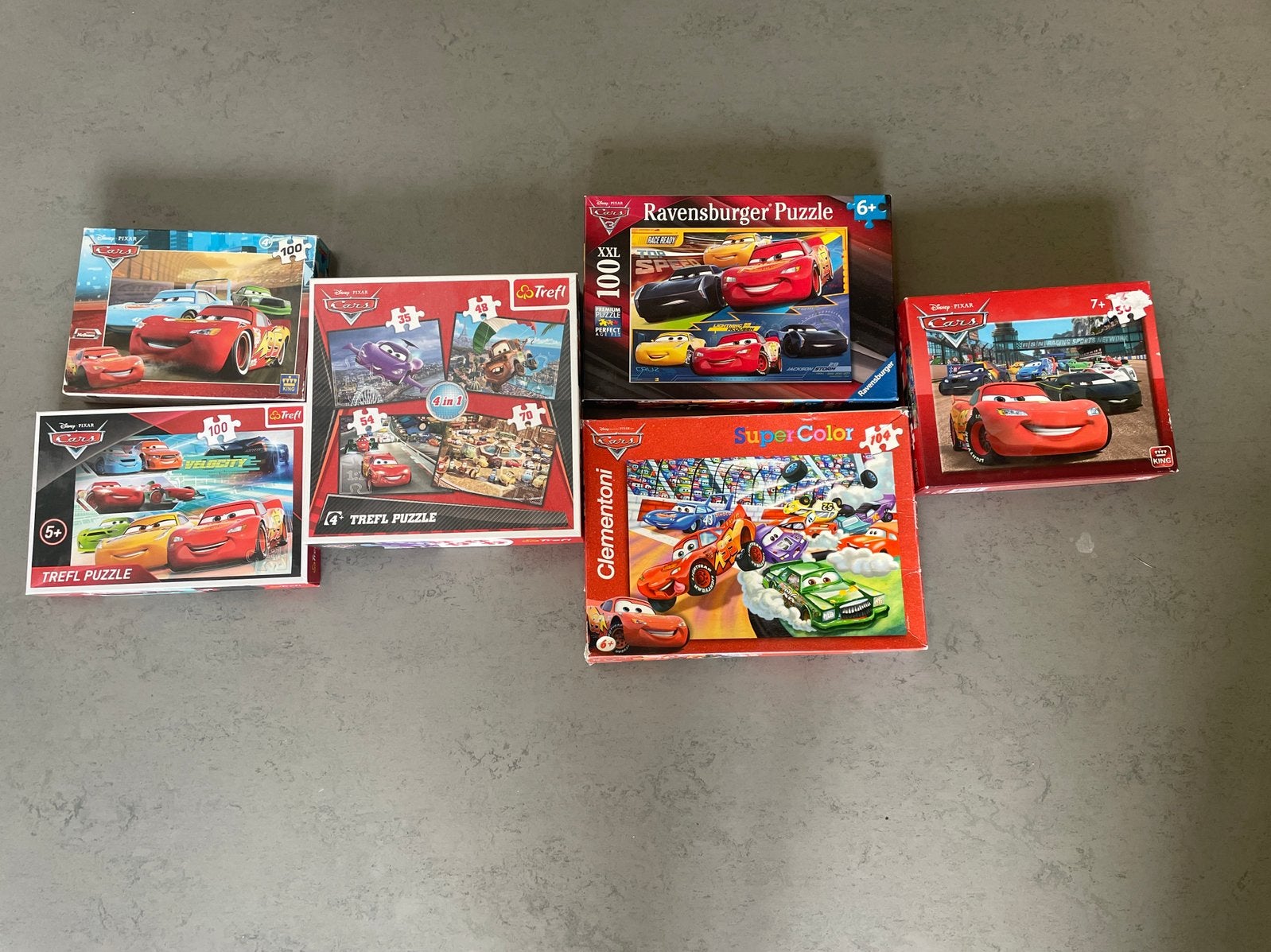 5 Disney Cars puzzels - Clementoni, Ravensburger, Trefl, Ophalen of Verzenden, Meer dan 50 stukjes, Gebruikt, 6 jaar of ouder