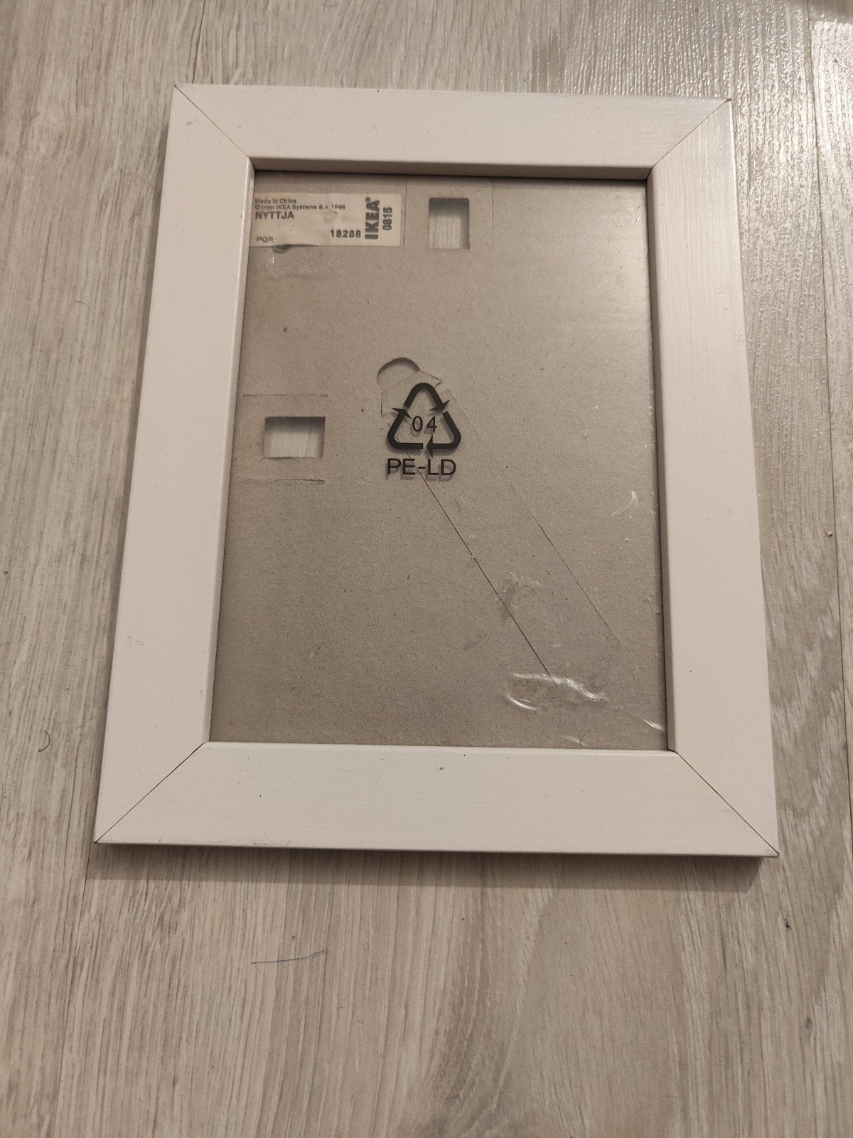Witte fotolijst IKEA NYTTJA - 17x21,5 cm, Hangend, Nieuw, Ophalen of Verzenden, Fotolijst