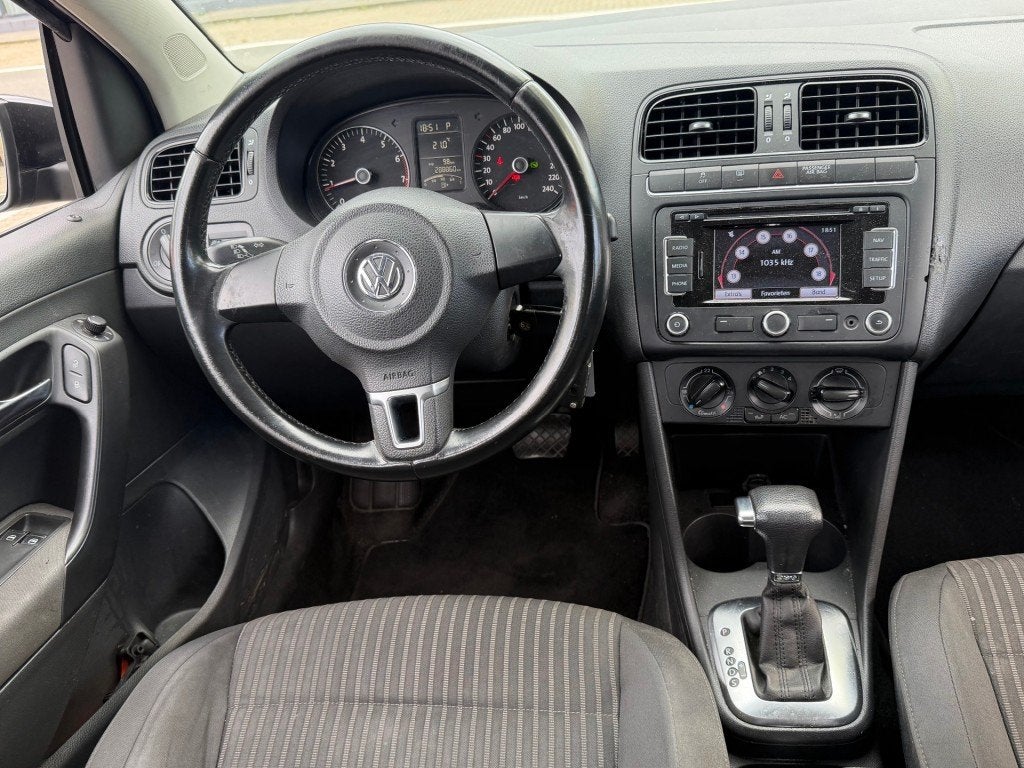 Volkswagen POLO 1.4-16V Comfortline 5DRS AUT NAVI AIRCO APK, Automaat, 86 pk, 4 cilinders, Zwart