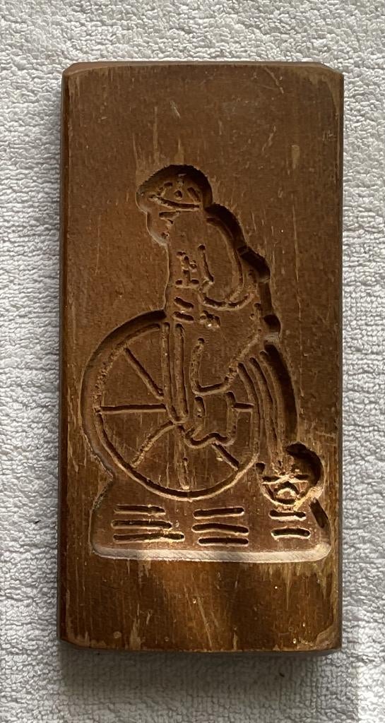 Speculaasplankje met bakvormpje “ouderwetse loopfiets”, Ophalen