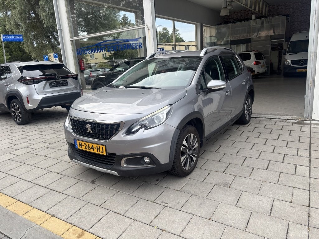 Peugeot 2008 1.2 PureTech Allure (bj 2018, automaat), Auto's, Euro 6, 1199 cc, 610 kg, Leder