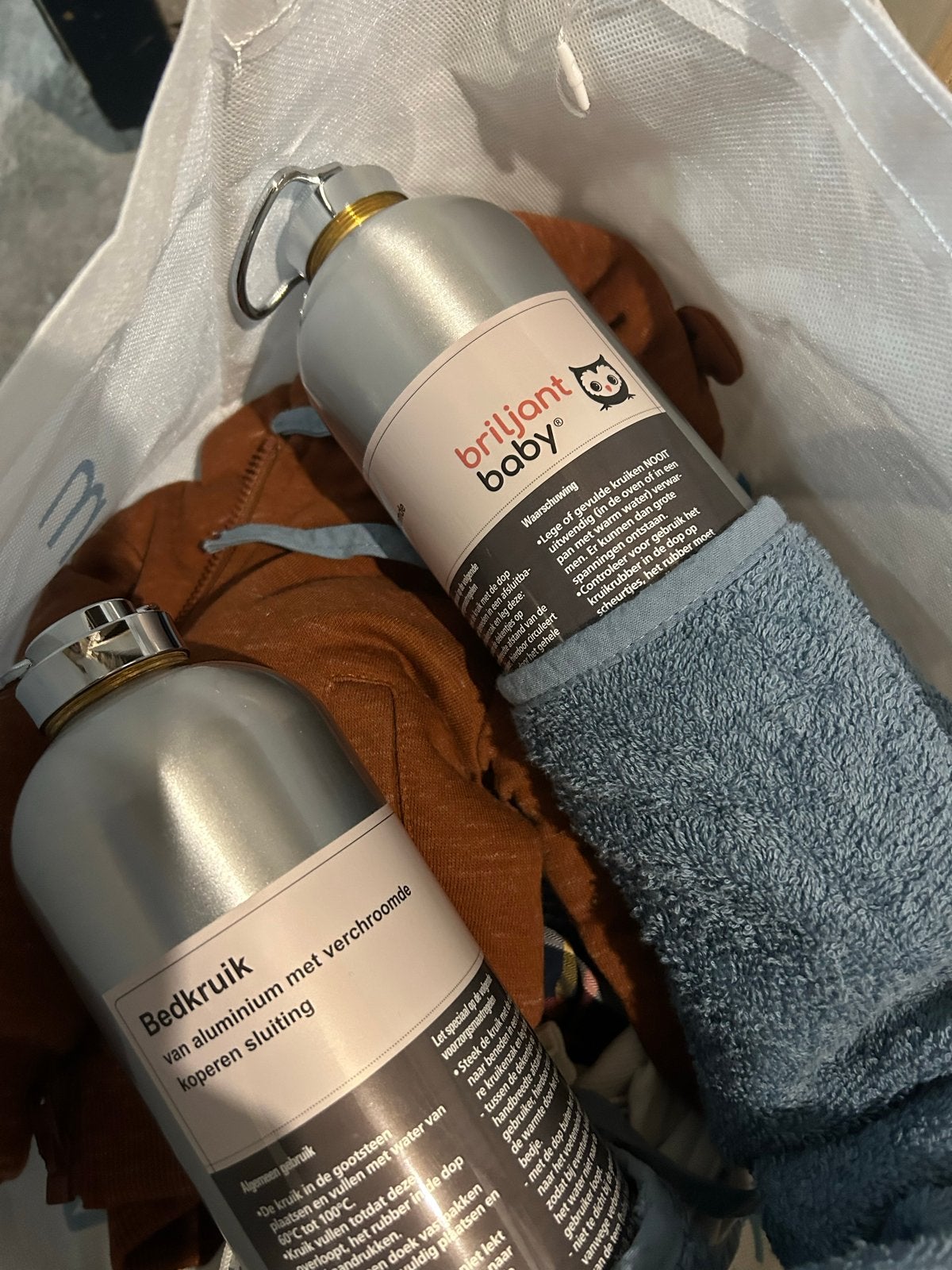 Grote partij babykleding, bedkruik, luiers en meer, Ophalen, Gebruikt