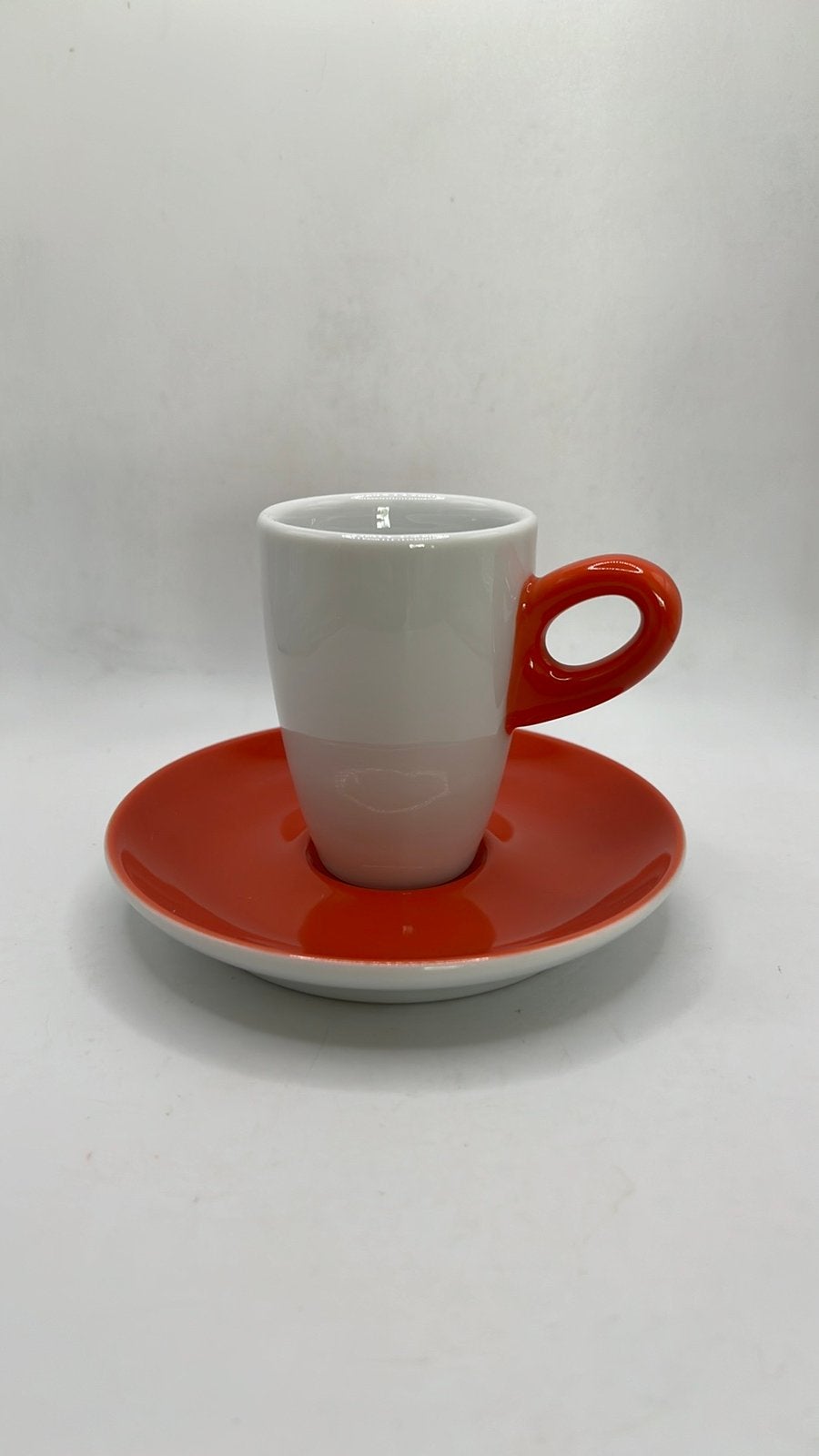 Walküre Alta espresso kop- en schotel oranje/wit., Ophalen of Verzenden, Zo goed als nieuw, Porselein, Kop en/of schotel