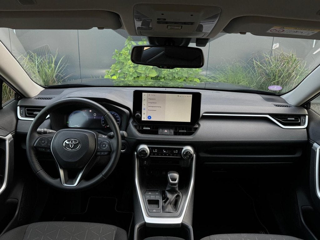 Toyota RAV4 2.5 MHEV Dynamic 2025 GARANTIE | TREKHAAK | NAVI, Auto's, Toyota, Automaat, Stof, Gebruikt, Zwart