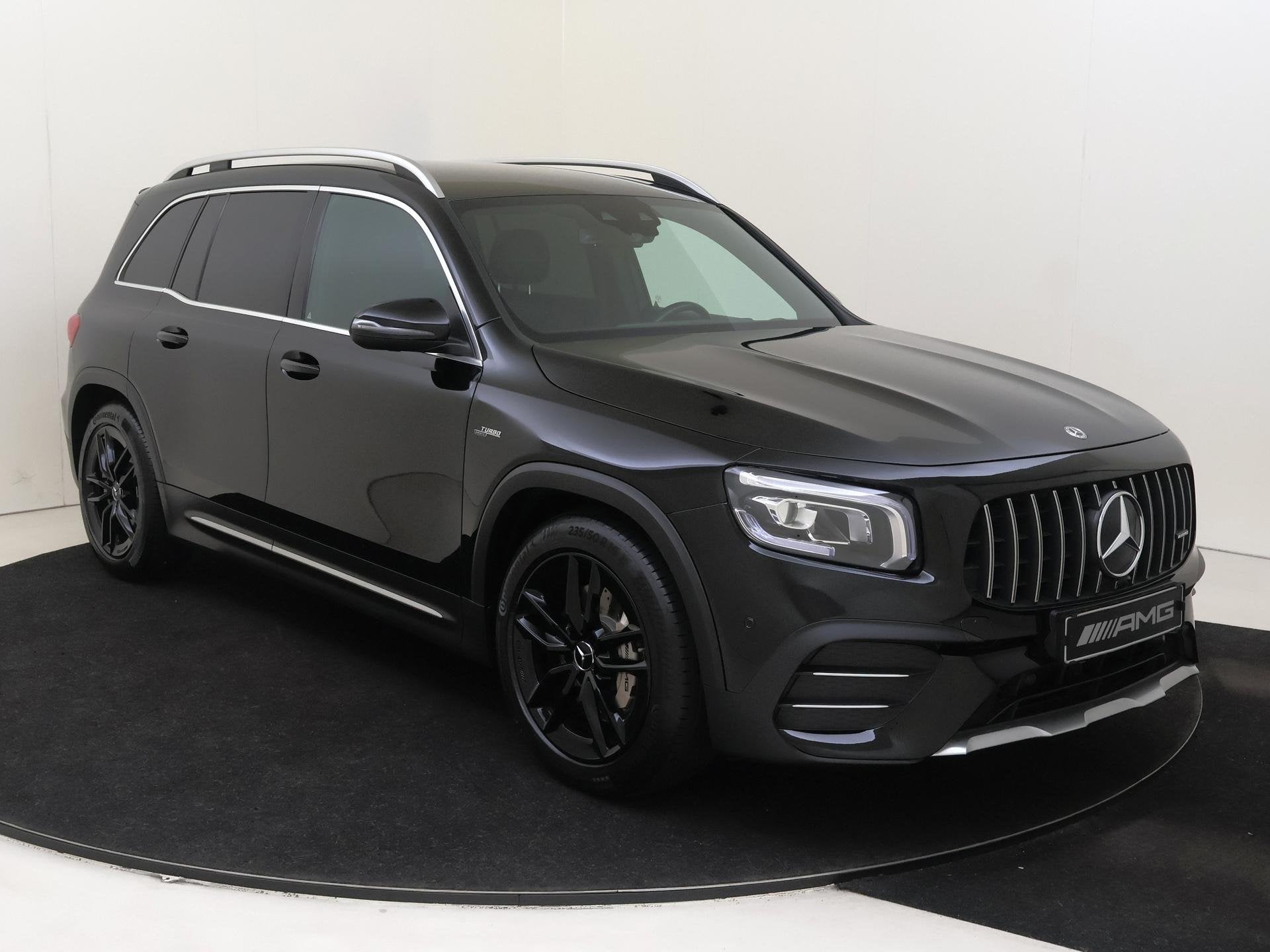Mercedes-Benz GLB AMG 35 4MATIC Premium Plus, Auto's, Euro 6, 4 cilinders, Leder en Stof, Zwart