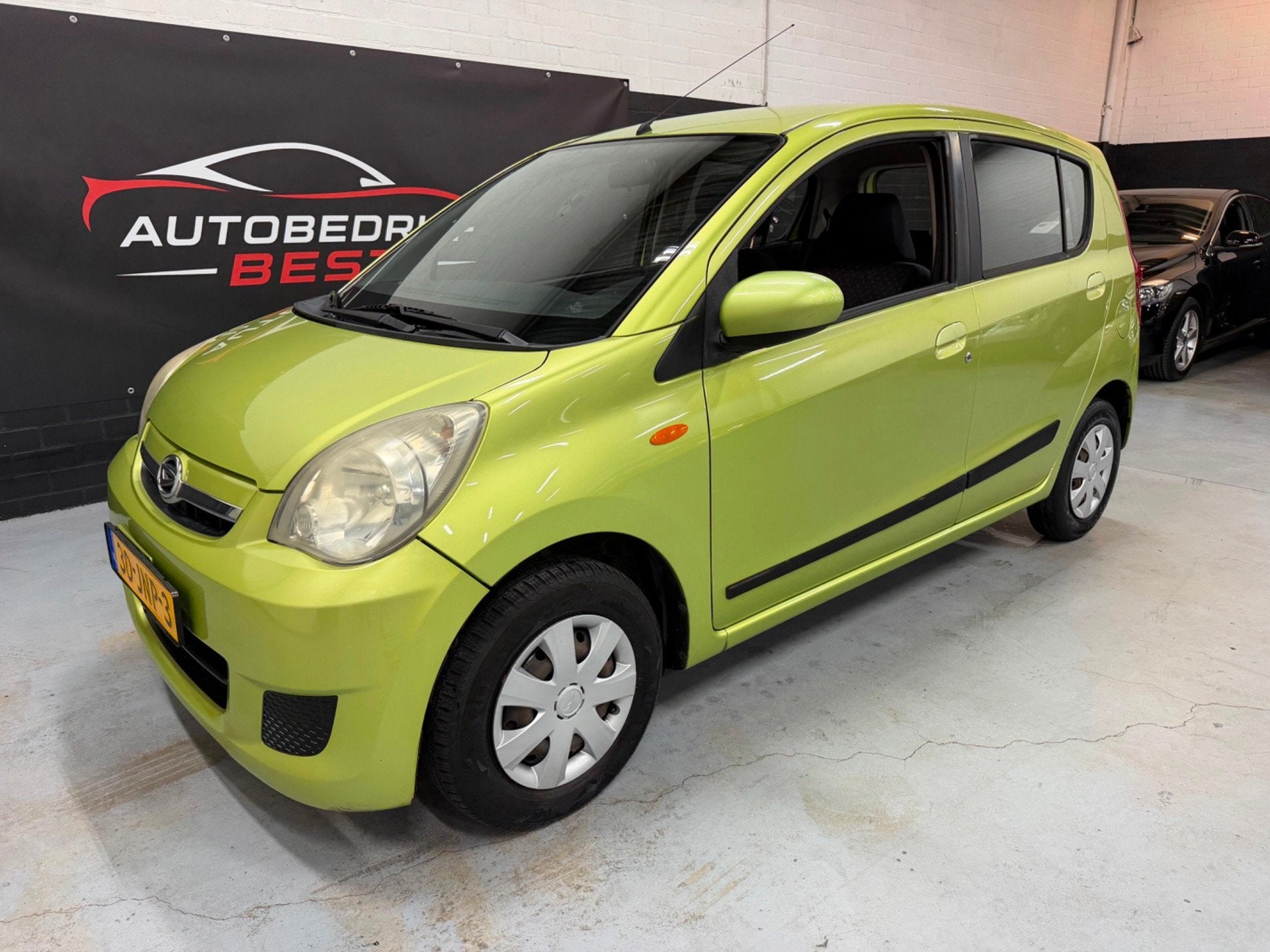 Daihatsu Cuore 1.0 Class Nap/Airco/APK 14-07-2027!, Auto's, Voorwielaandrijving, Dealer onderhouden, Stof, Zwart