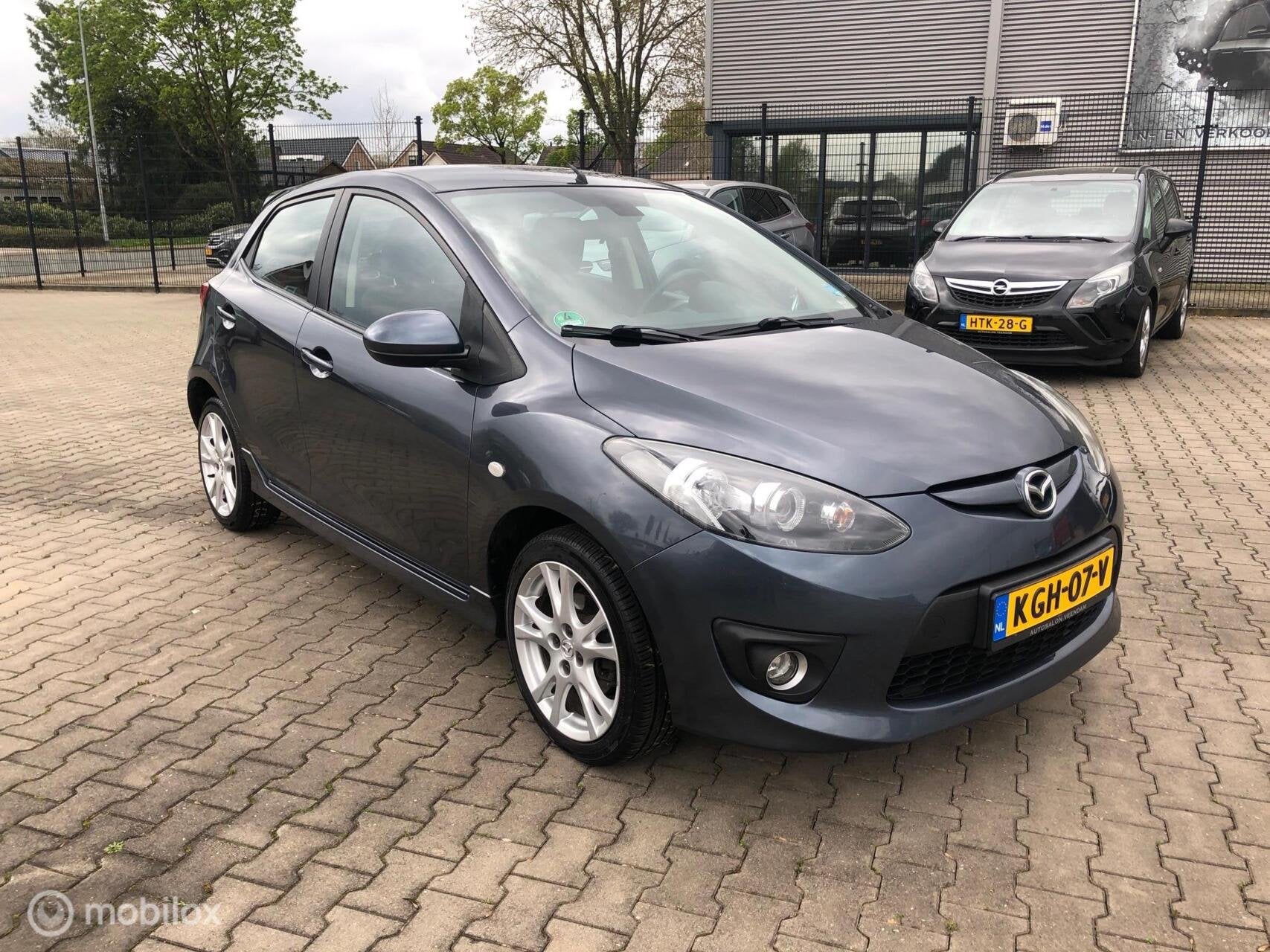 Mazda 2 1.3 TS SPORT AIRCO ELL PAKK LMV, Auto's, Mazda, Voorwielaandrijving, Gebruikt, Zwart, Bedrijf