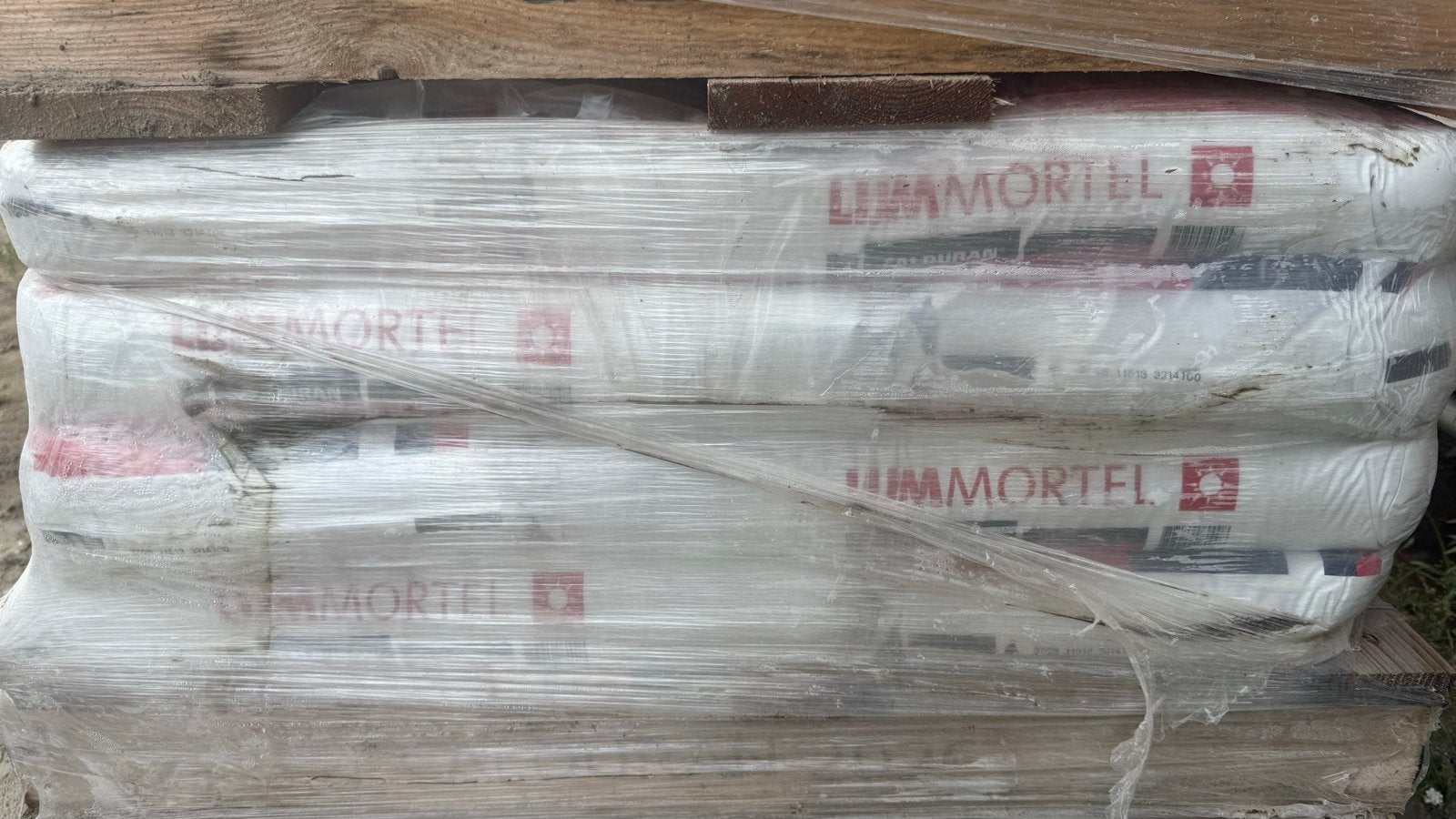Nieuwe zakkenlijm mortel calduran 31 stuks, Doe-het-zelf en Verbouw, Ophalen, Nieuw