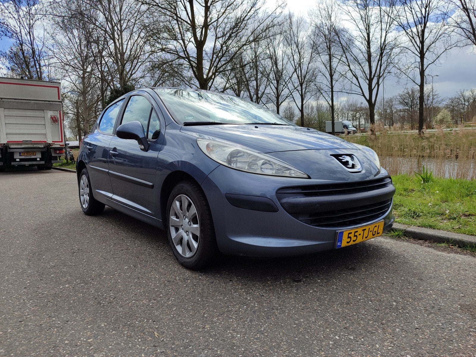 Peugeot 207 1.4 16V 5DRS 2006 Grijs, Auto's, Voorwielaandrijving, Stof, 1360 cc, Zwart