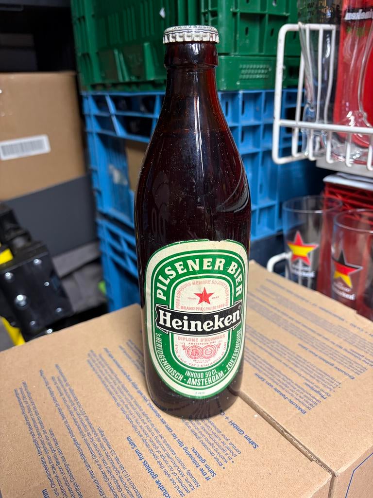 Hele aparte Heineken halve liter met Amstel kroonkurk, Ophalen, Zo goed als nieuw, Glas of Glazen, Amstel
