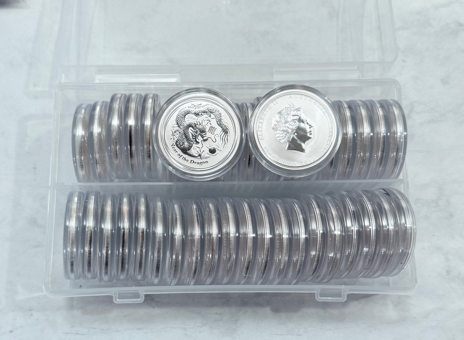 42x 1/2 oz 2012 Lunar 2 - Dragon / Draak 999 zilver, Postzegels en Munten, Munten | Oceanië, Ophalen of Verzenden, Zilver
