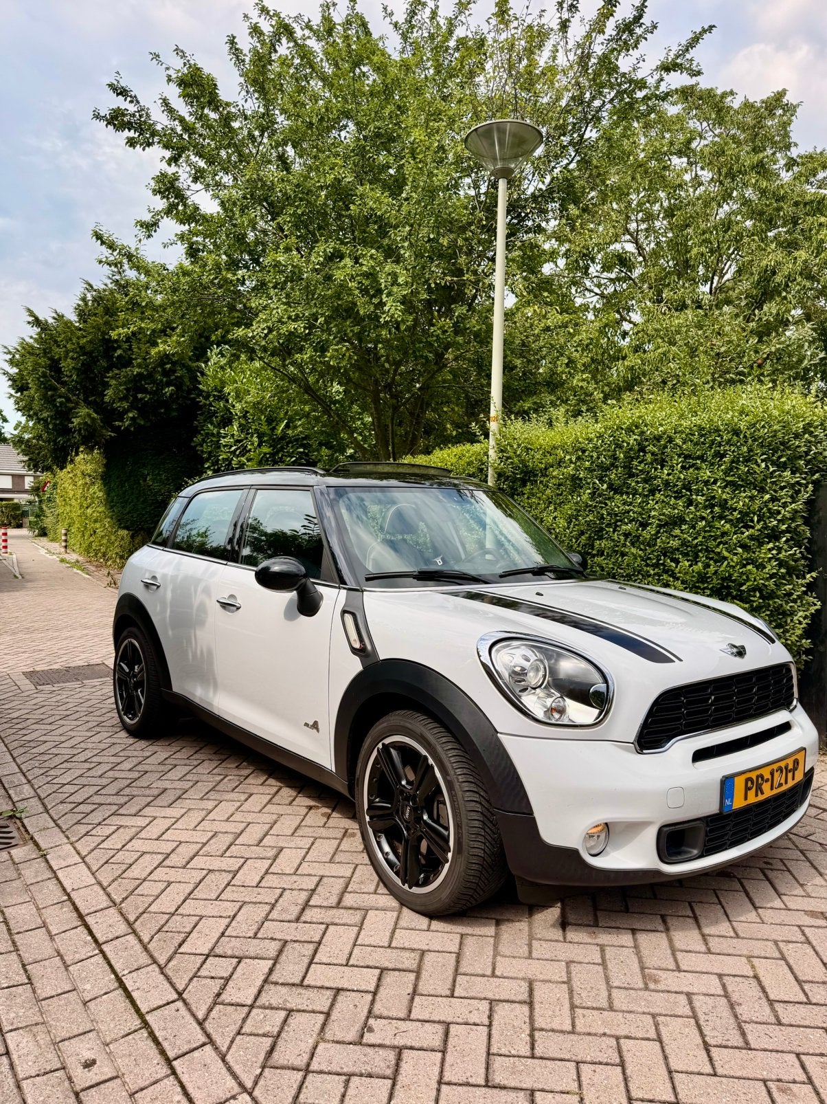 Mini Countryman 1.6 184pk All4 Aut. Wit. Nieuwe distributie, Auto's, 1380 kg, Zwart, Wit, Leder