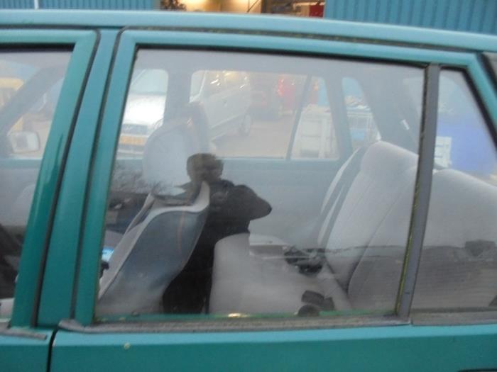 Portierruit 4Deurs links-achter van een Suzuki Alto, Gebruikt, -, -, Ophalen of Verzenden