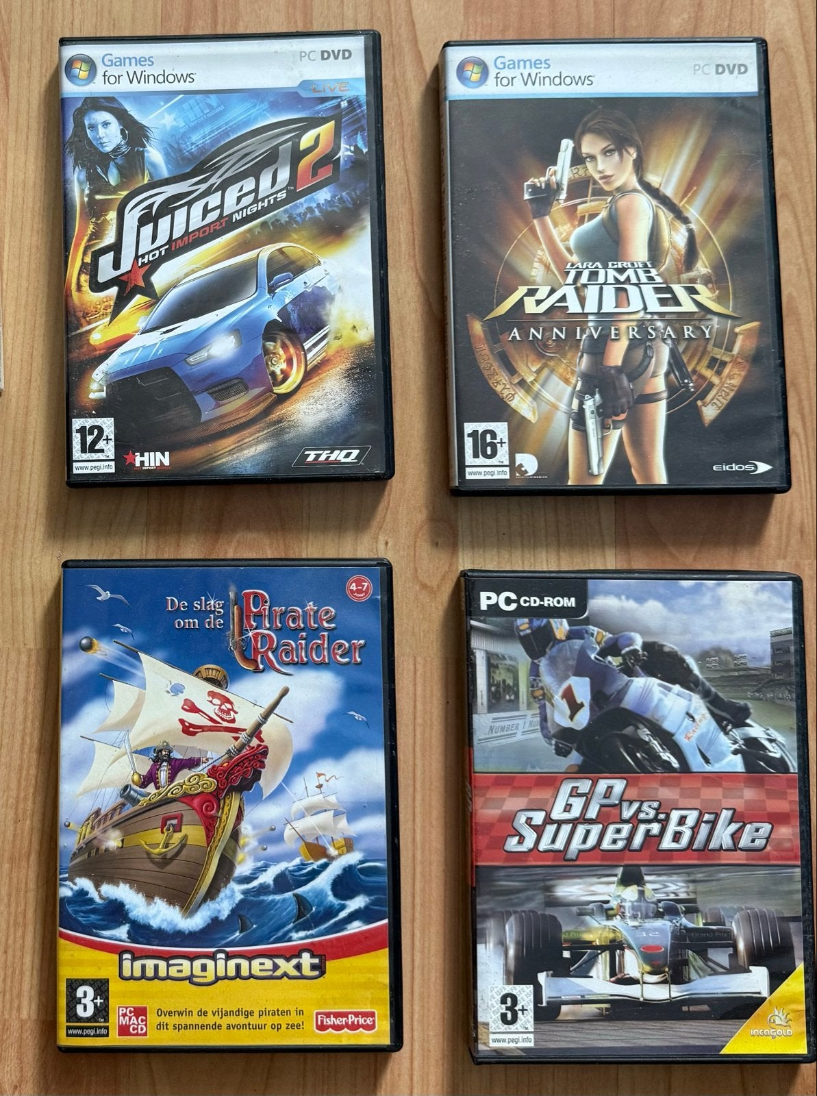 PC Games Bundel: Juiced 2, Tomb Raider, Pirate Raider, GP vs, Spelcomputers en Games, Games | Pc, Gebruikt, 1 speler, Racen en Vliegen