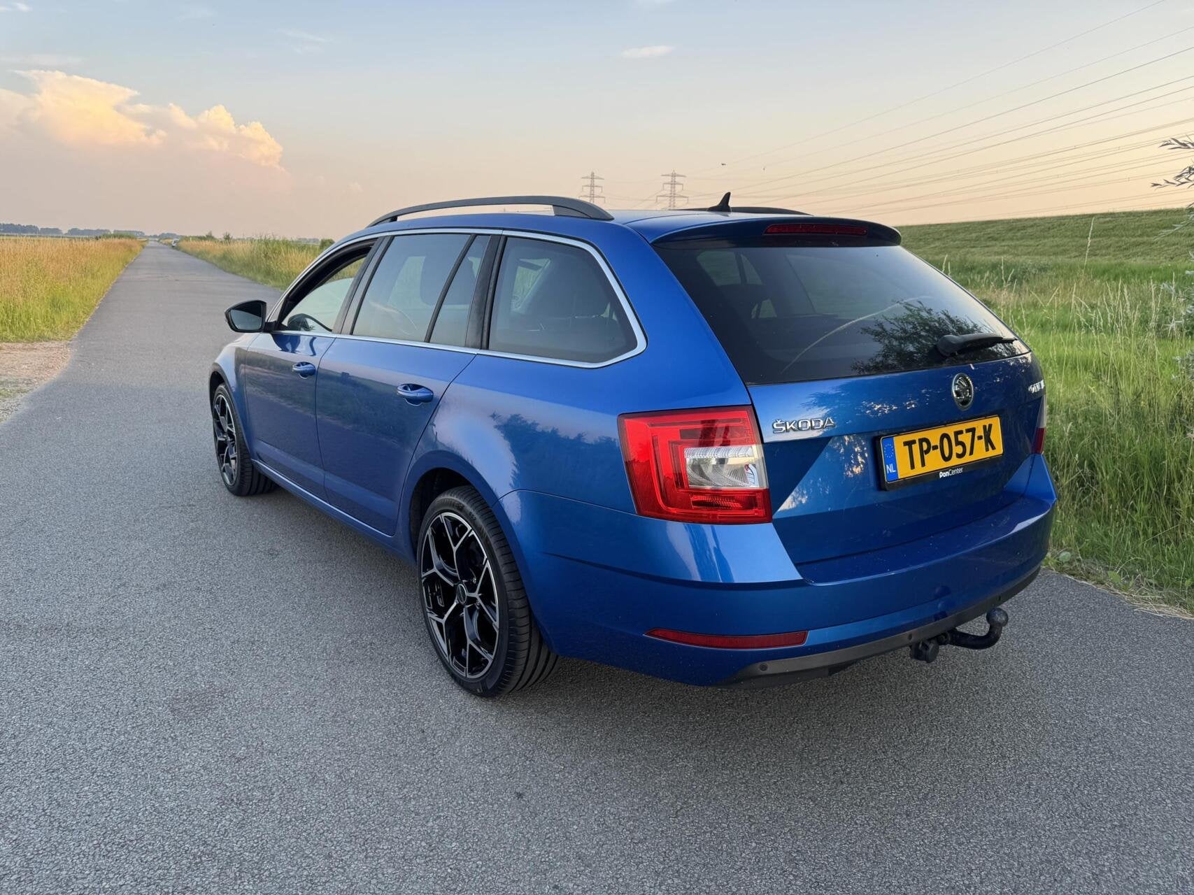 Skoda Octavia Combi TSI automaat Greentech Ambition Business, Auto's, Gebruikt, Euro 6, Met garantie (alle), Blauw