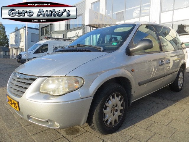 Chrysler Voyager 3.3i V6 SE Luxe nw apk ,6 zits ,airco ecc e, Auto's, 3301 cc, 450 kg, Met garantie (alle), 7 stoelen