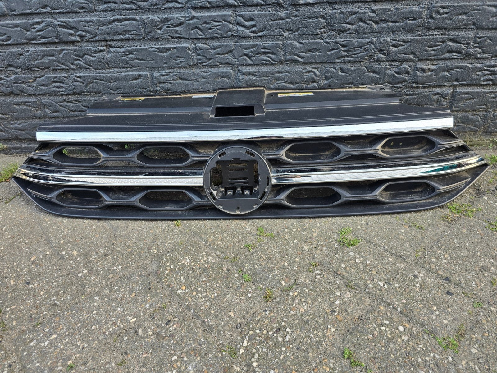Grille VW T- roc 2GA facelift bj 2021-2025, Gebruikt, Wolfsburg, Ophalen of Verzenden, Excellence