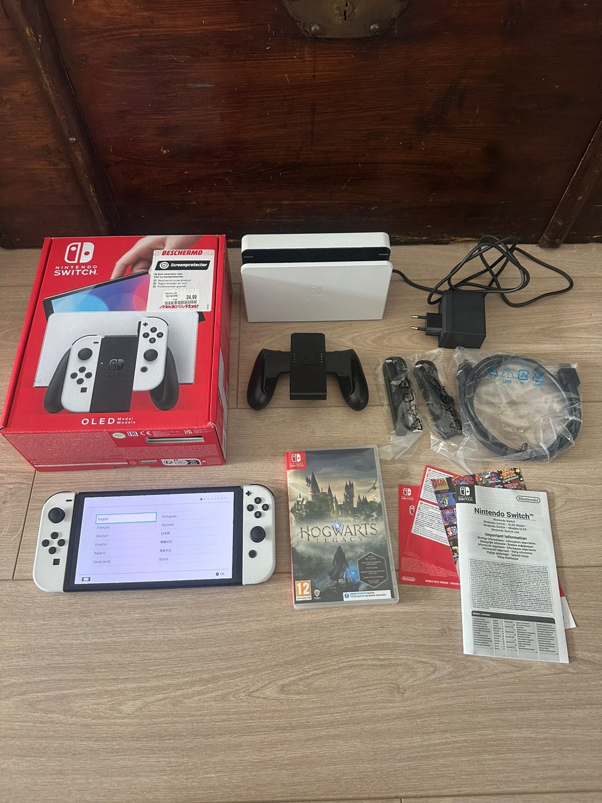 Nintendo Switch OLED wit + GARANTIE + Hogwarts Legacy, Spelcomputers en Games, Spelcomputers | Nintendo Switch, Zo goed als nieuw