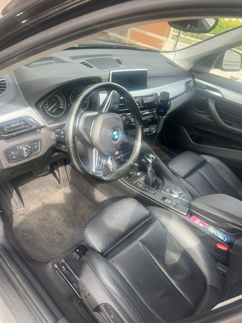 Foto 4 van BMW X1 Sdrive18d High Executive Aut 2017 Zwart