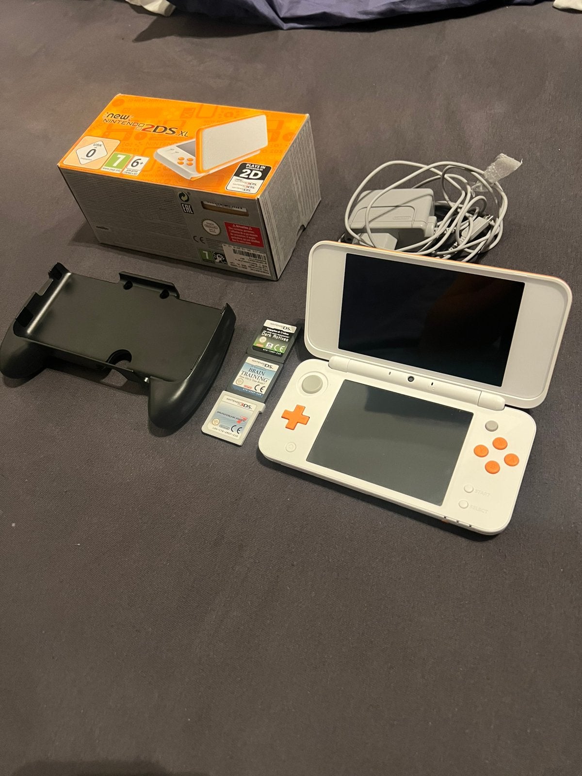 New nintendo 2ds xl in nieuwstaat, Spelcomputers en Games, Spelcomputers | Nintendo 2DS en 3DS, Met games, Wit, 2DS, Ophalen of Verzenden